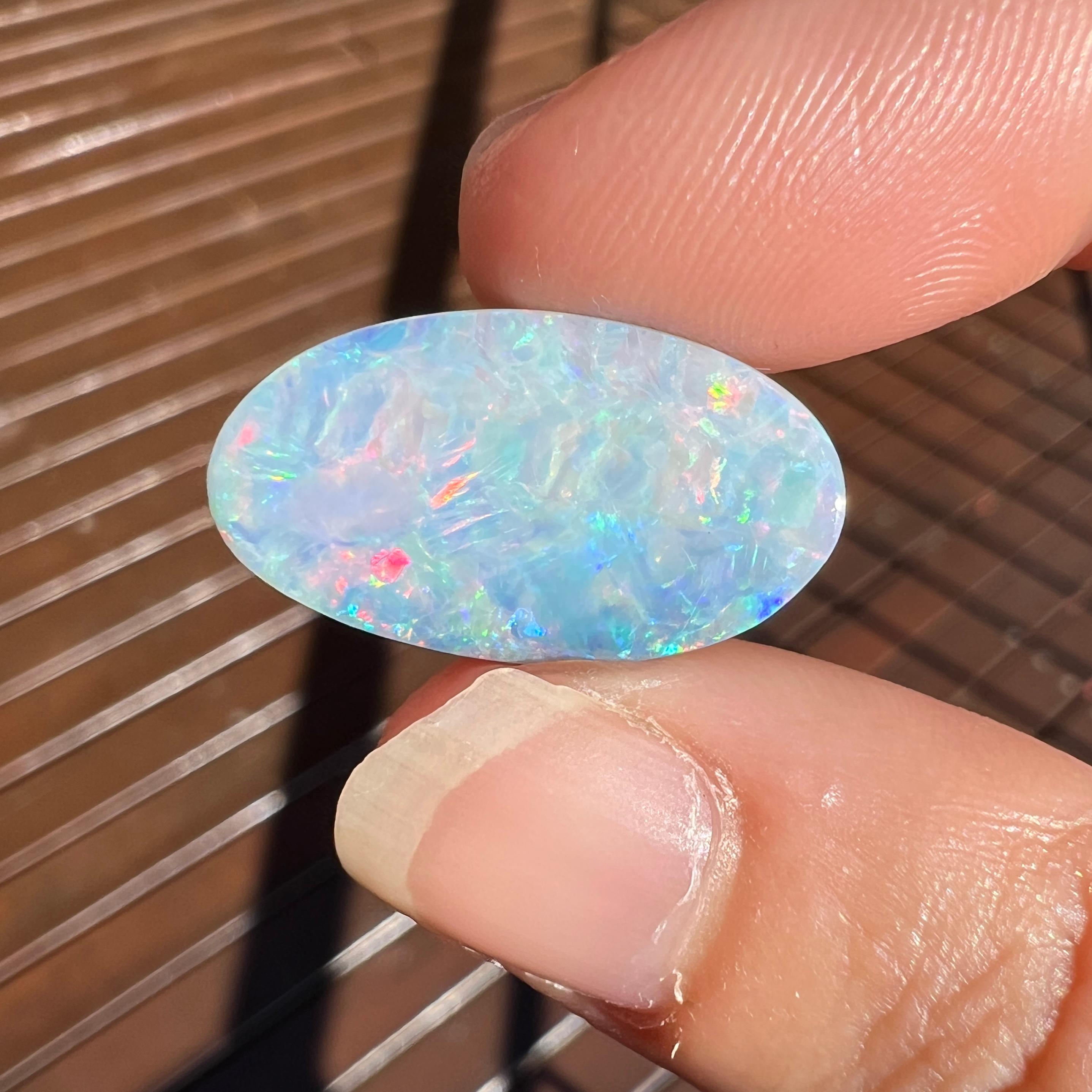 Cabochon Natural 11.52 Ct Australian rainbow boulder opal mined by Sue Cooper For Sale