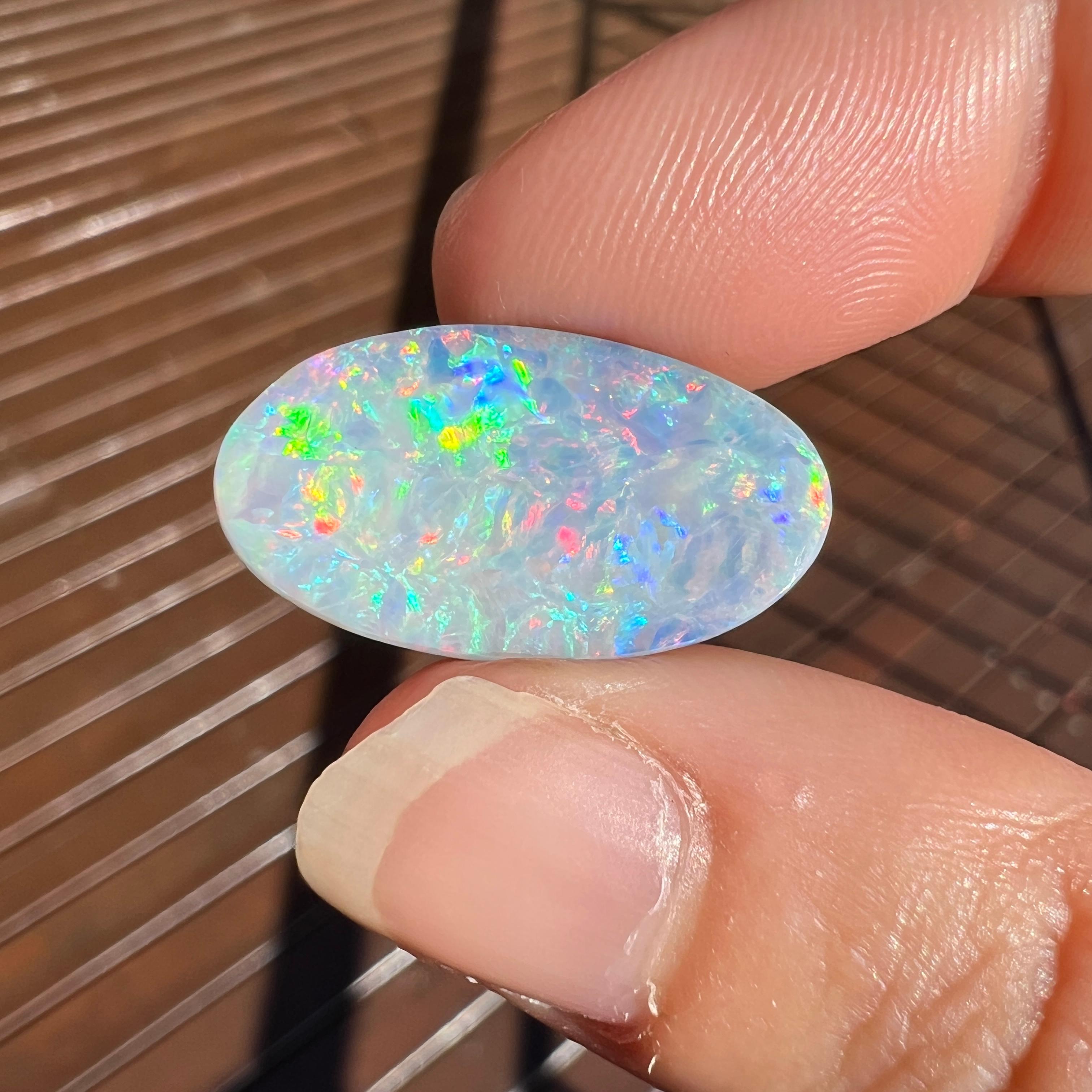 Cabochon Natural 11.52 Ct Australian rainbow boulder opal mined by Sue Cooper For Sale