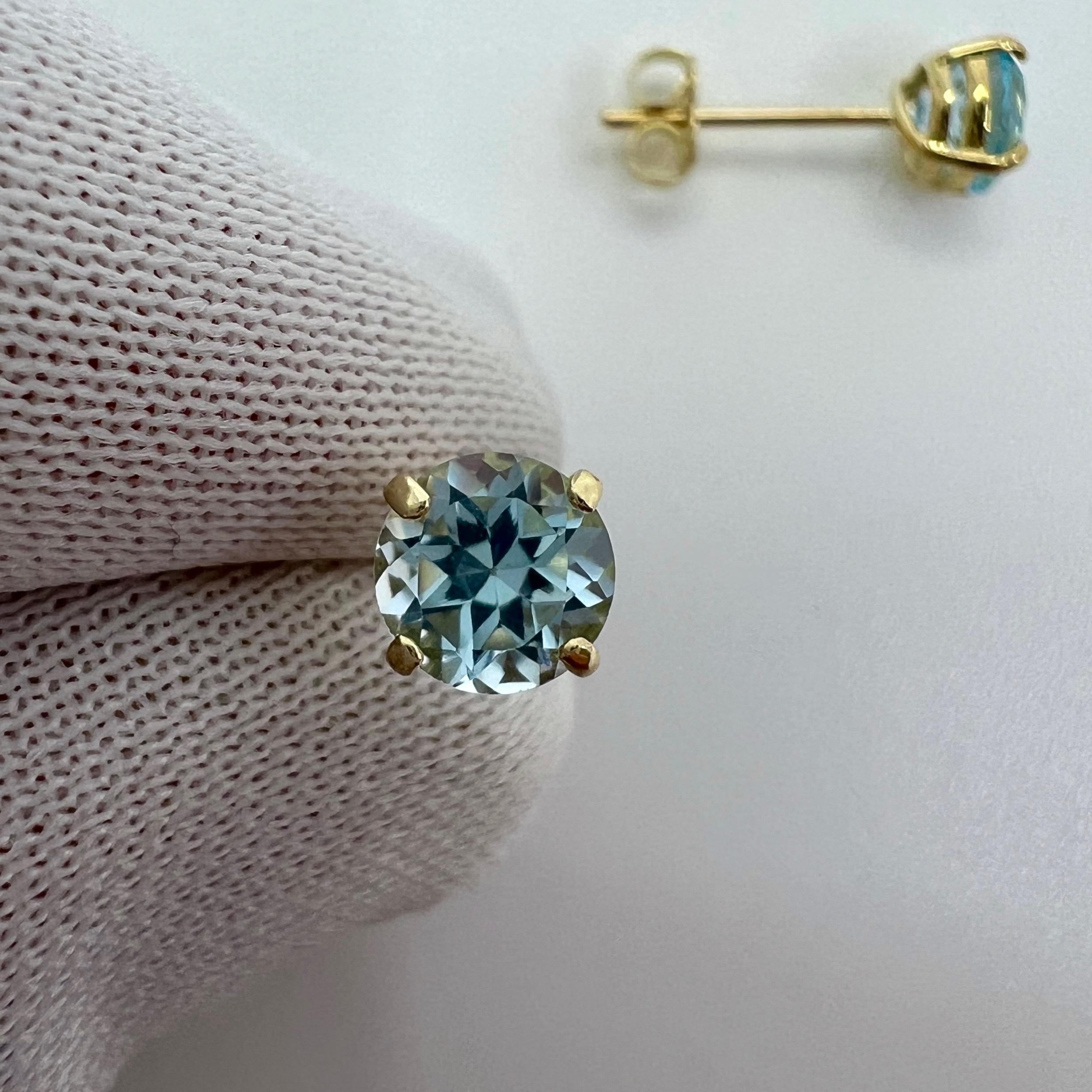 Natural 1.15ct Vivid Sky Blue Topaz Round Cut Yellow Gold 9k Stud Earrings For Sale 1