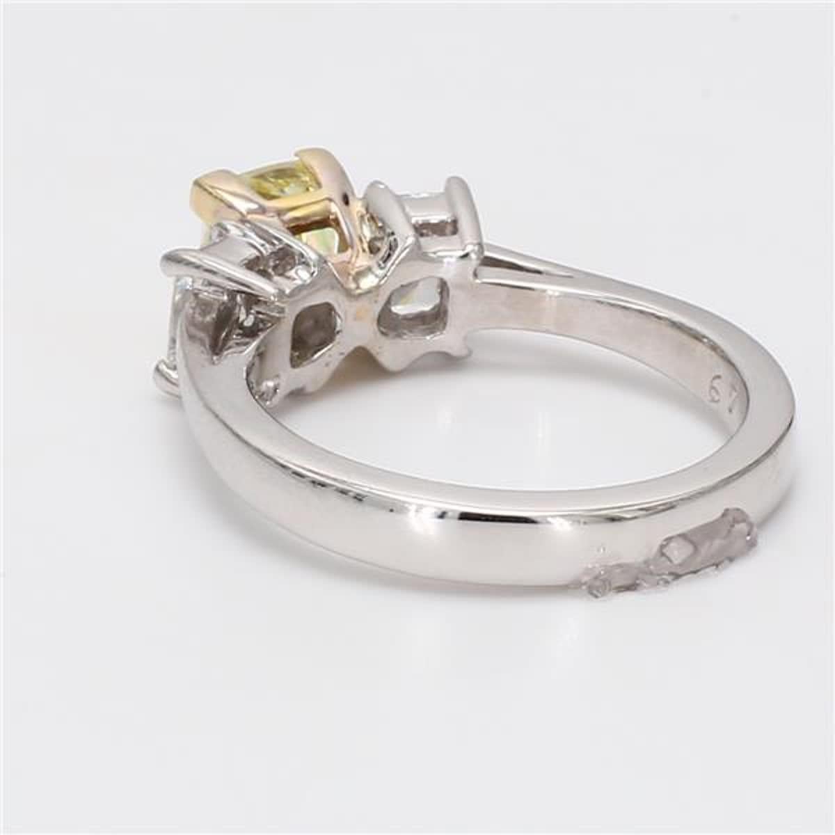 RareGemWorld's classic GIA certified diamond ring. Mounted in a beautiful 14K Yellow and White Gold setting with a natural cushion cut yellow diamond complimented by natural radiant cut white diamonds. This ring is guaranteed to impress and enhance