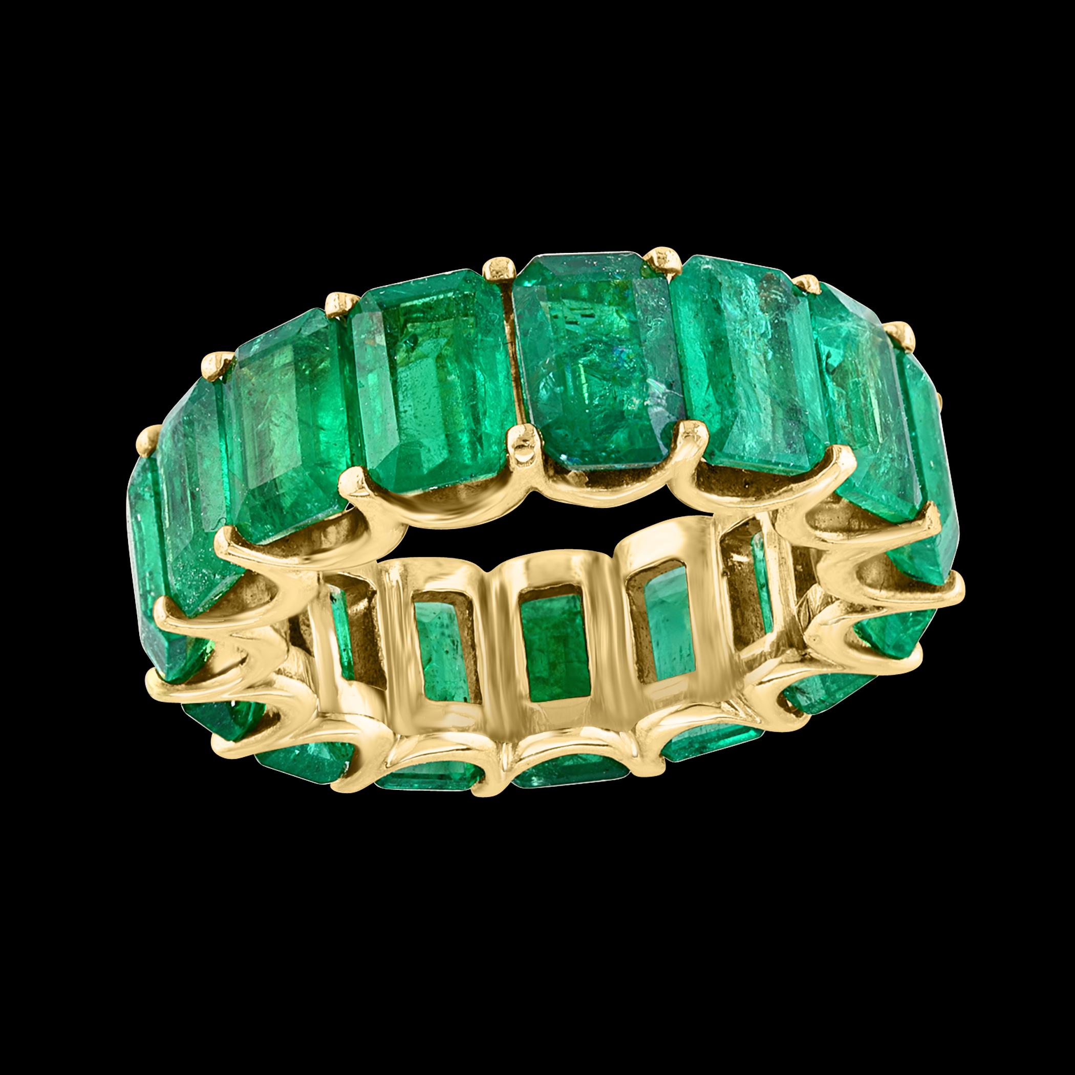Natural approximately  12 Ct High Quality Zambian Emerald Cut Emerald Eternity Band/ Ring 14 Karat yellow Gold

A Masterpiece is an understatement. This Gorgeous Natural Emerald Cut Green Emeralds Eternity Band is the perfect addition to your stack