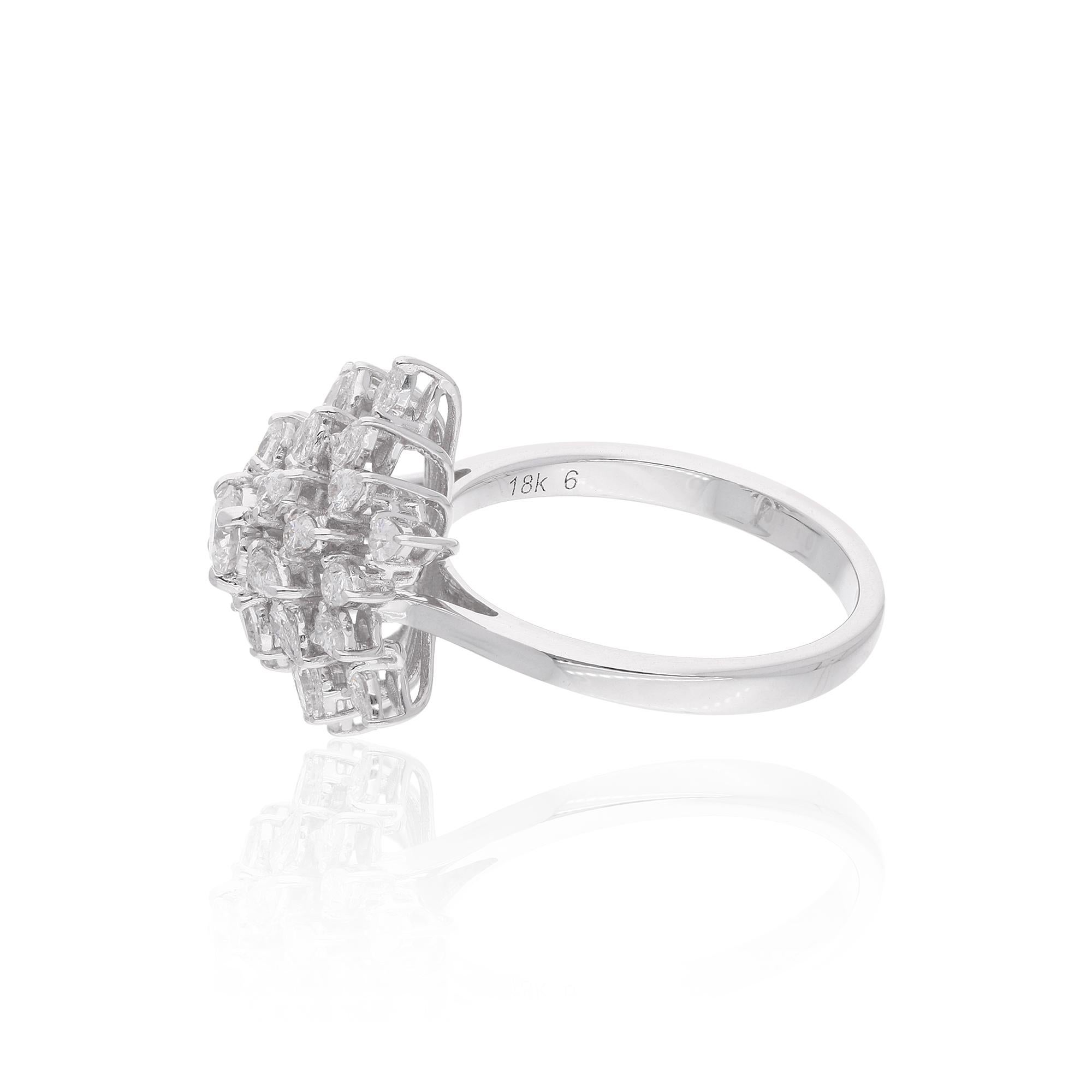 Crafted in solid 18k Gold, this ring features a cluster of sparkling diamonds, creating a truly dazzling effect. The diamonds are expertly set in a secure prong setting, ensuring that they stay in place and catch the light at every angle. This ring