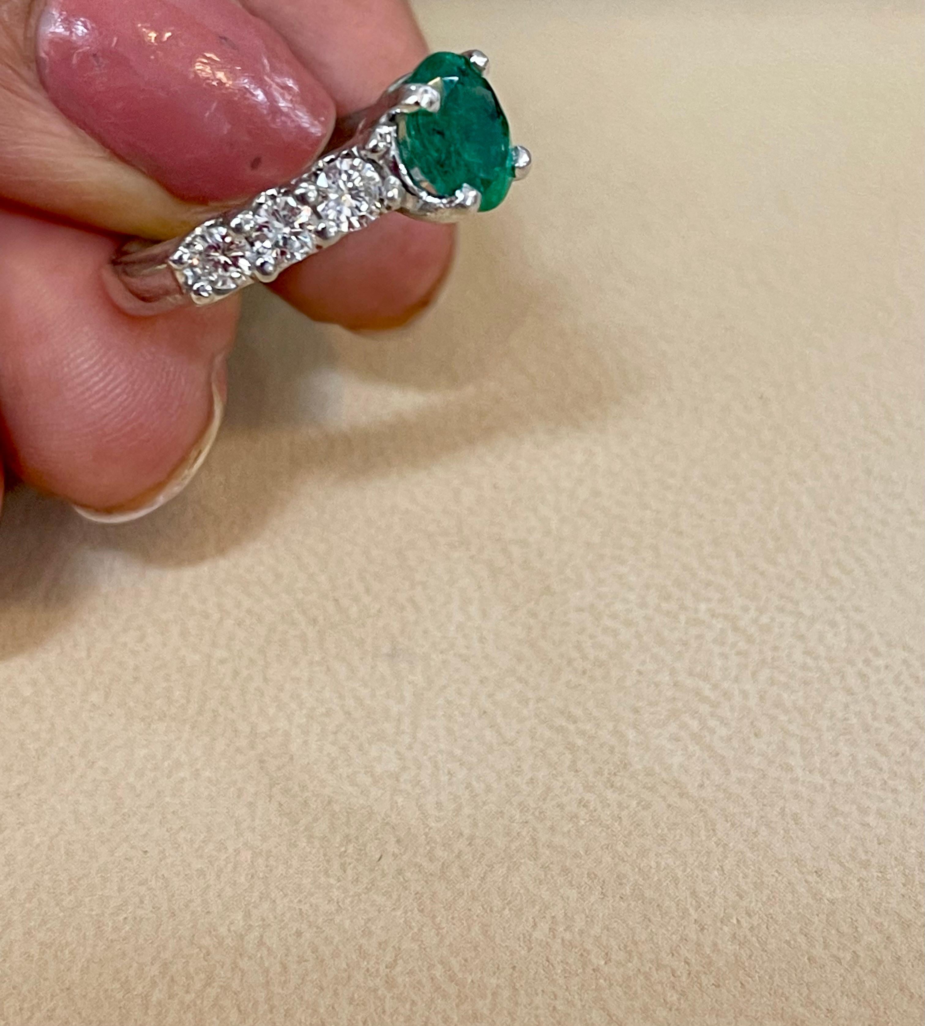 Natural 1.25 Carat Oval Cut Emerald & 0.90 Carat Diamond Ring Platinum For Sale 5