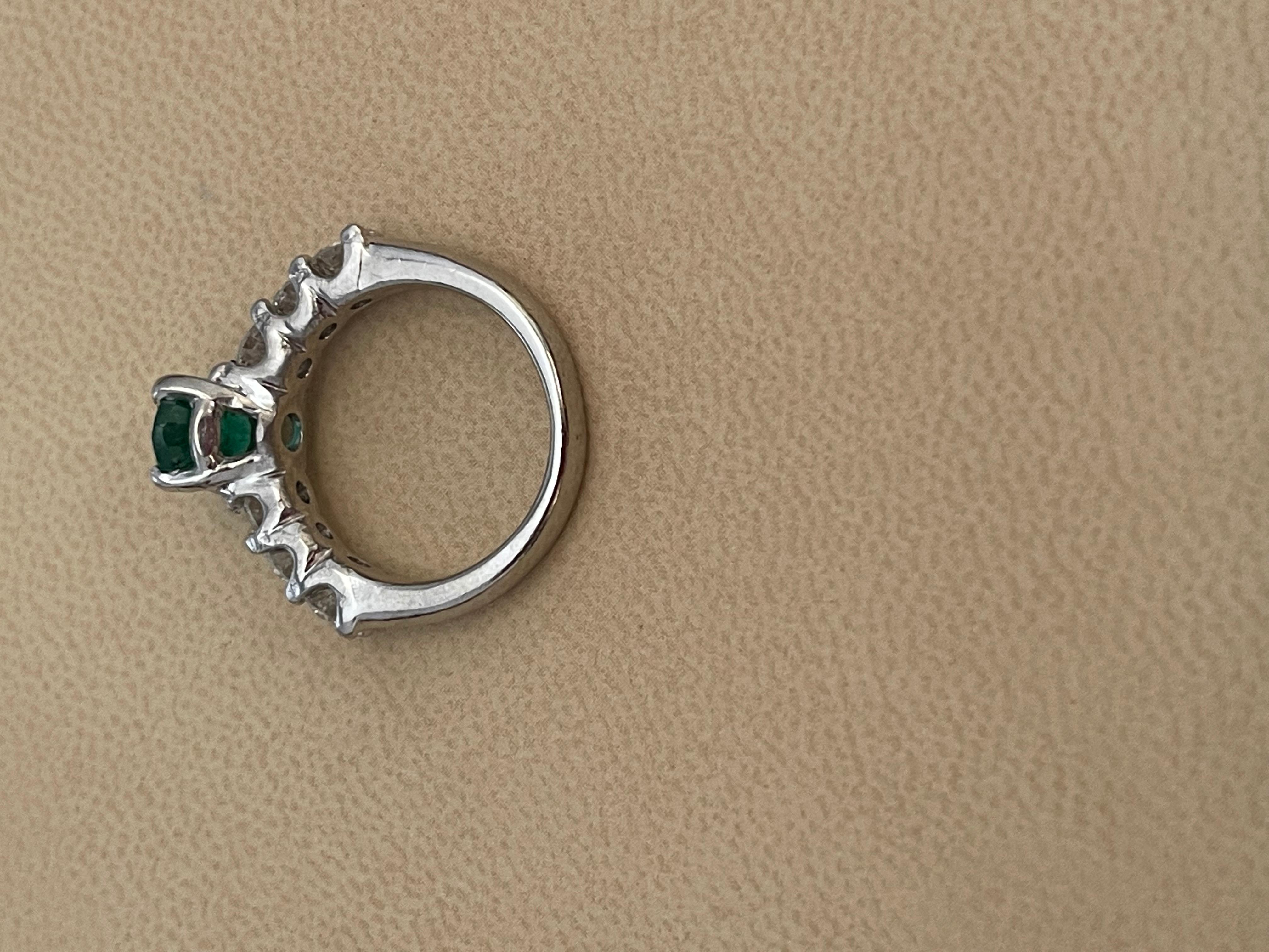 Natural 1.25 Carat Oval Cut Emerald & 0.90 Carat Diamond Ring Platinum For Sale 6