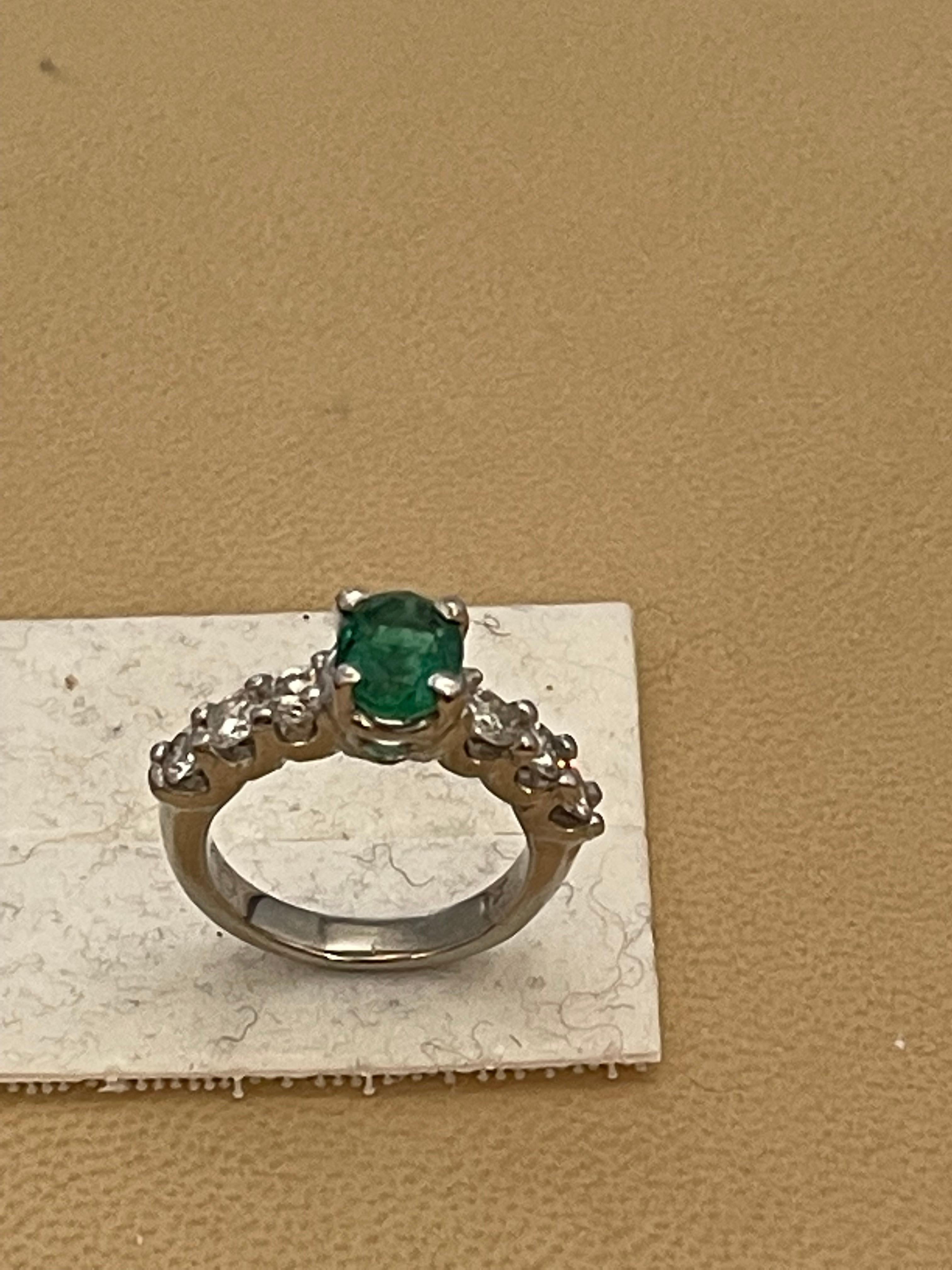 Natural 1.25 Carat Oval Cut Emerald & 0.90 Carat Diamond Ring Platinum For Sale 7