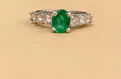 Natural 1.25 Carat Oval Cut Emerald & 0.90 Carat Diamond Ring Platinum