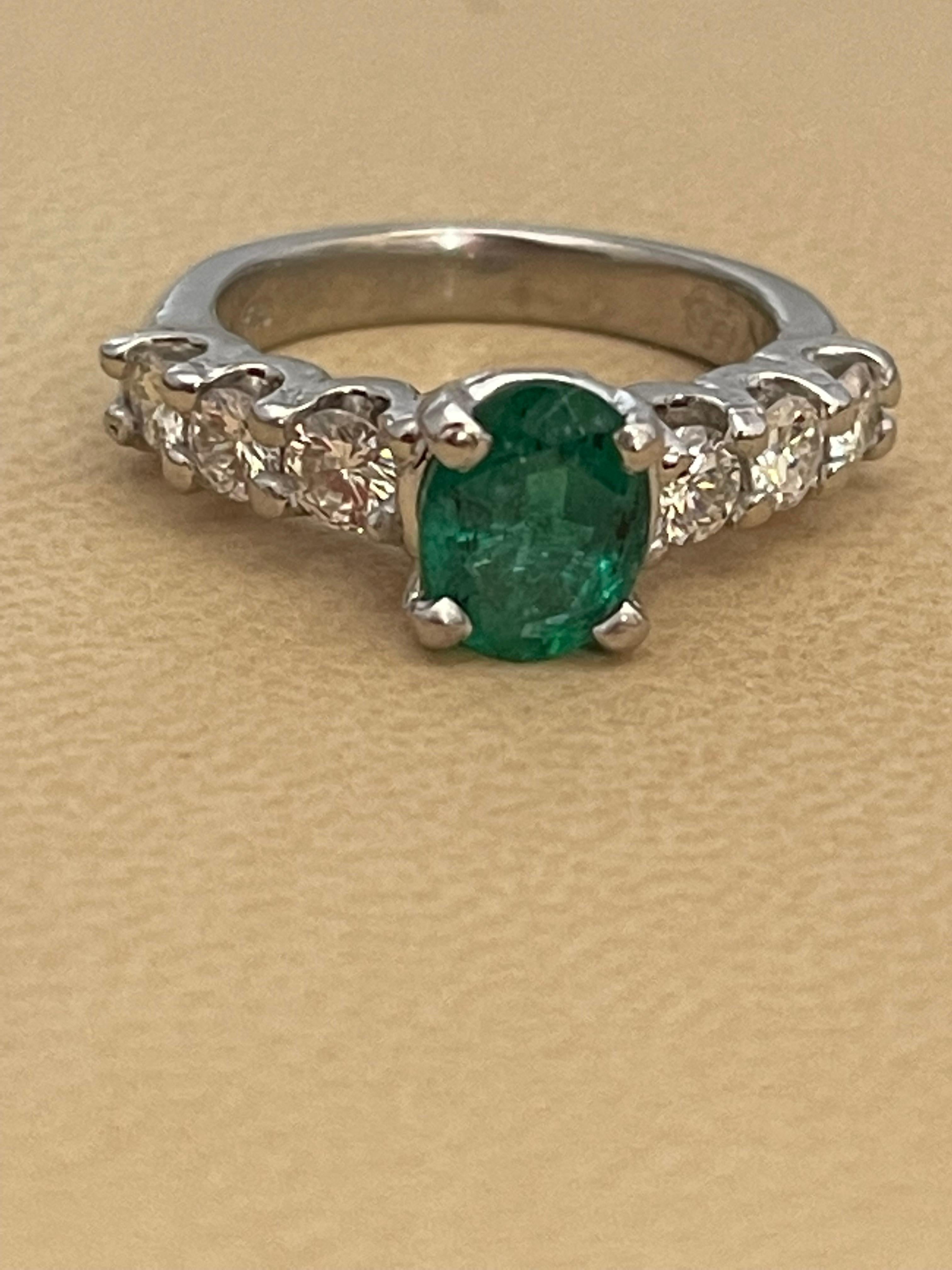 Natural 1.25 Carat Oval Cut Emerald & 0.90 Carat Diamond Ring Platinum In Excellent Condition For Sale In New York, NY