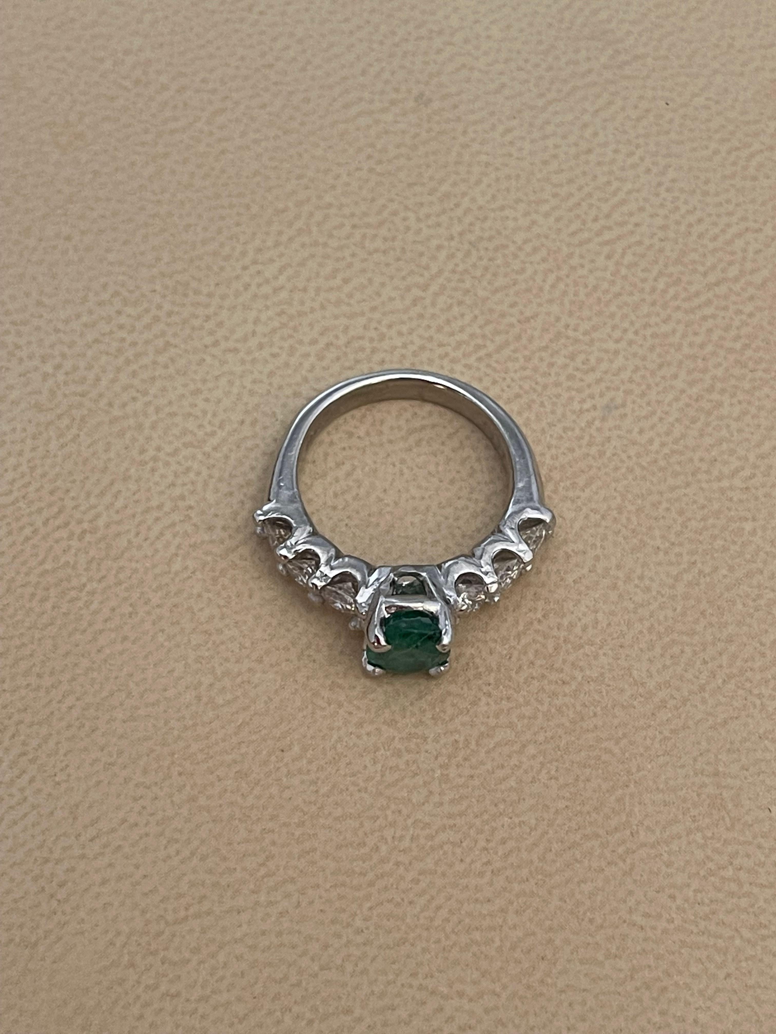 Natural 1.25 Carat Oval Cut Emerald & 0.90 Carat Diamond Ring Platinum For Sale 1