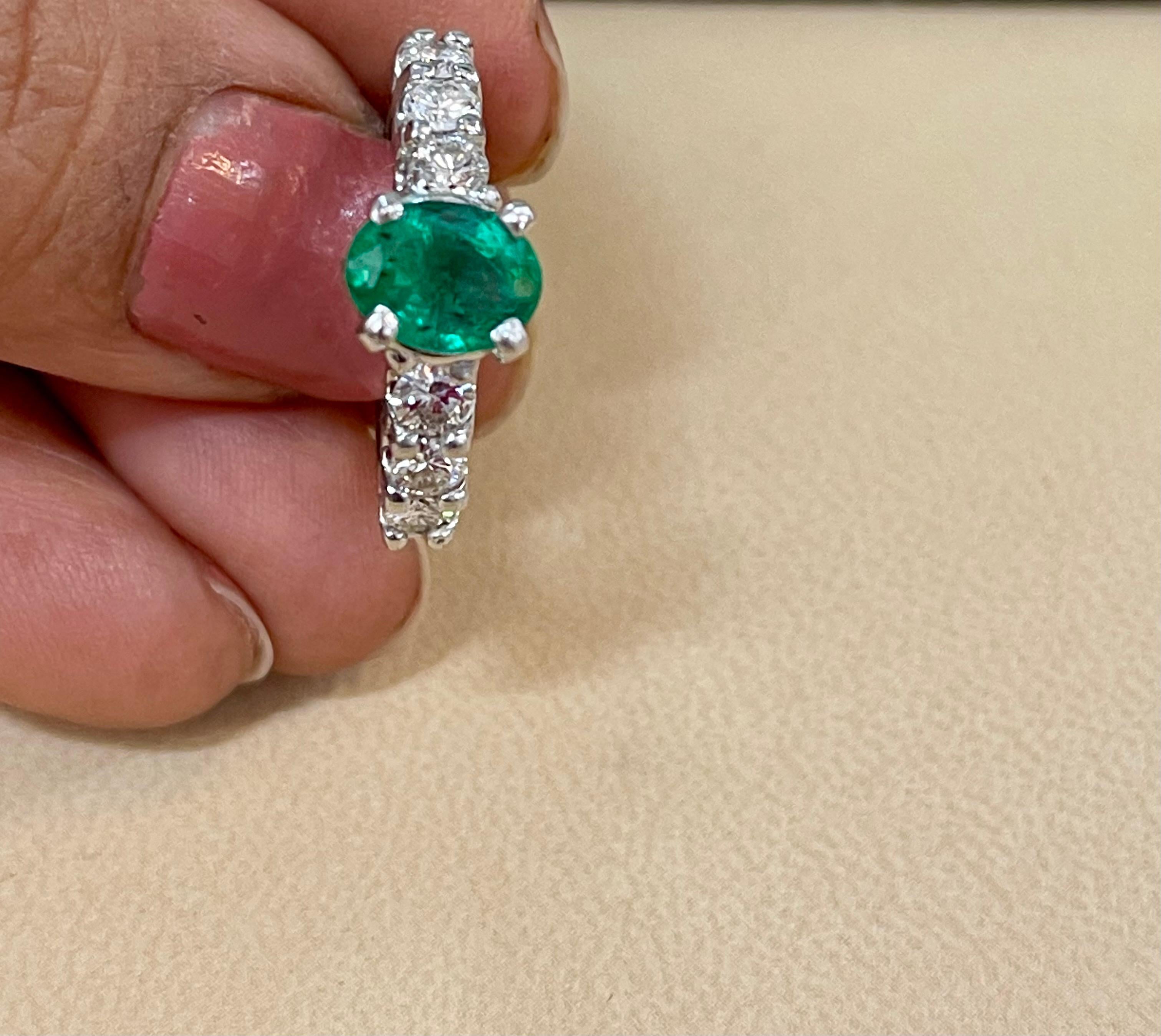 Natural 1.25 Carat Oval Cut Emerald & 0.90 Carat Diamond Ring Platinum For Sale 4