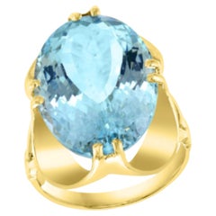 Bague « halo » en or jaune 14 carats avec aigue-marine, 12,54 carats, de créateur