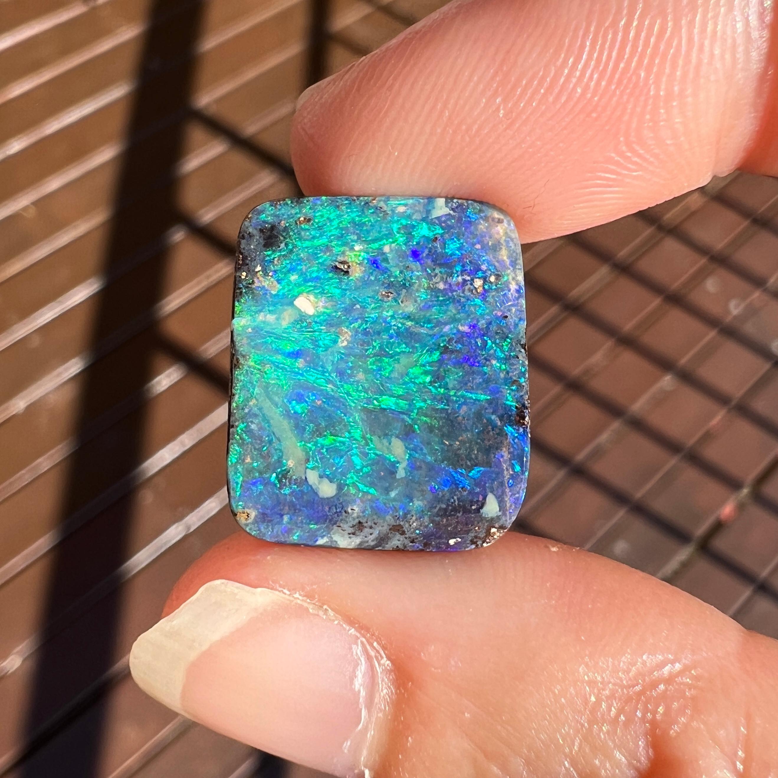 Cabochon Natural 12.61 Ct Australian green-blue black boulder opal mined by Sue Cooper For Sale