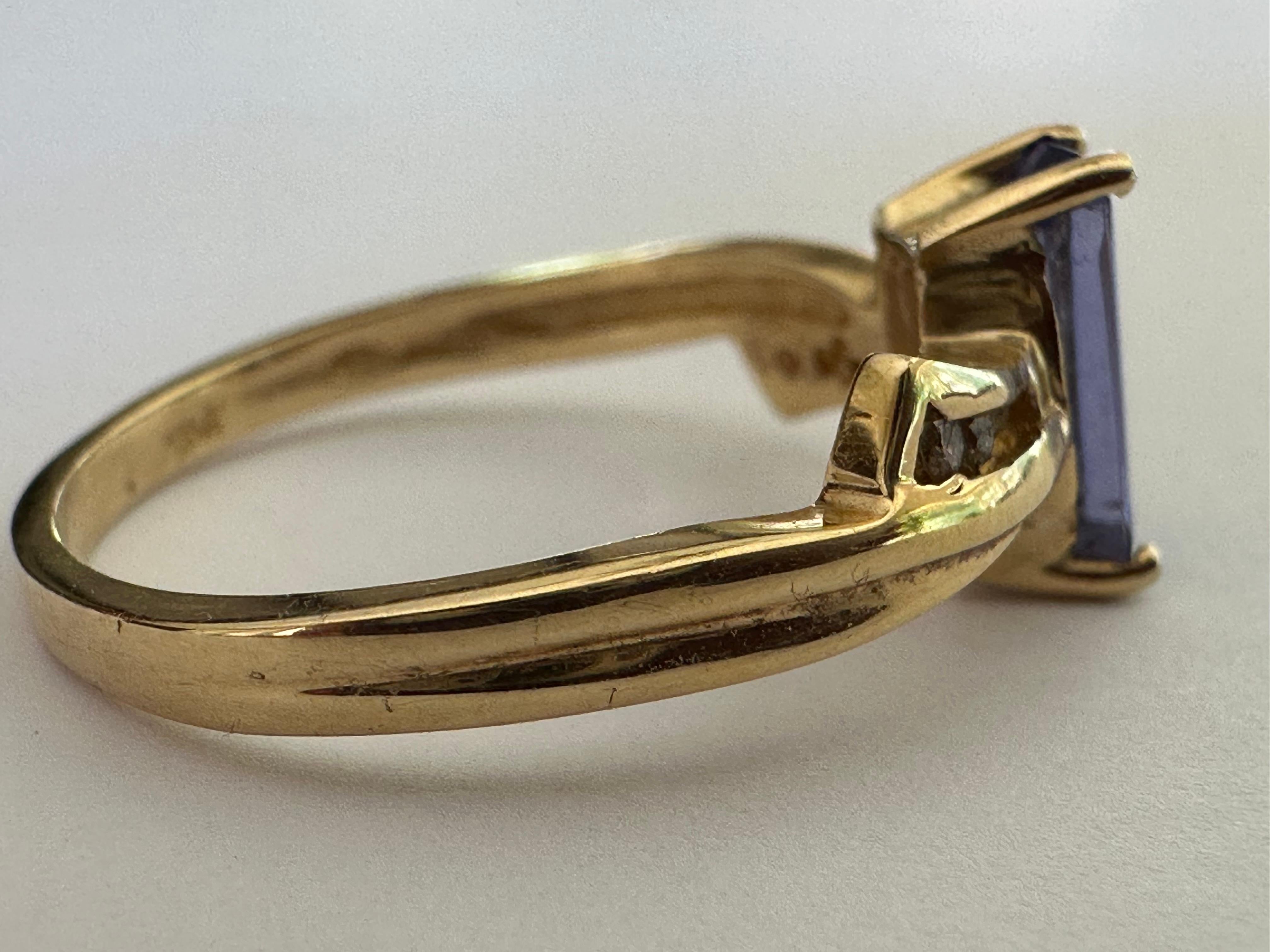 Natural 1.28-Carat Light Blue Tanzanite and Diamond Bow Ring In Good Condition For Sale In Denver, CO