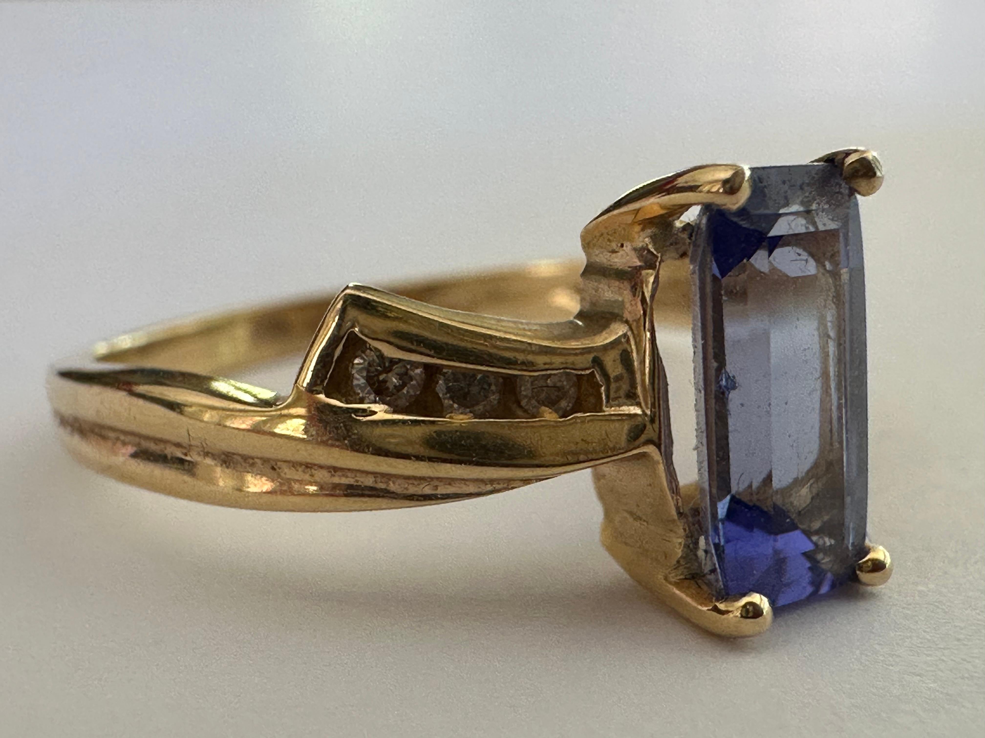 Women's Natural 1.28-Carat Light Blue Tanzanite and Diamond Bow Ring For Sale