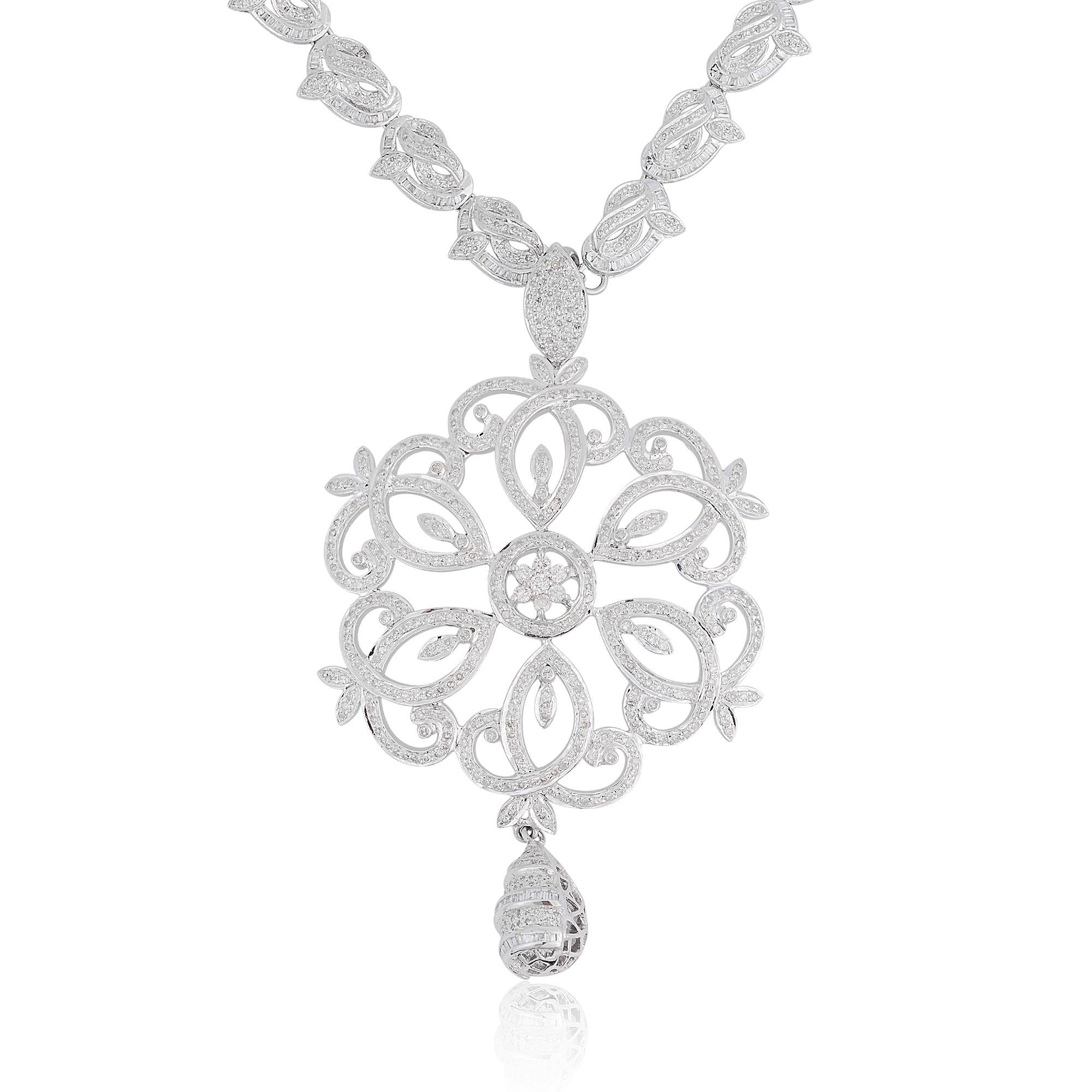 This breathtaking pendant necklace features a magnificent 12.80 carat natural diamond in a stunning flower design, adorned with a pave diamond setting. Crafted with silver, this piece of jewelry is a true testament to opulence and