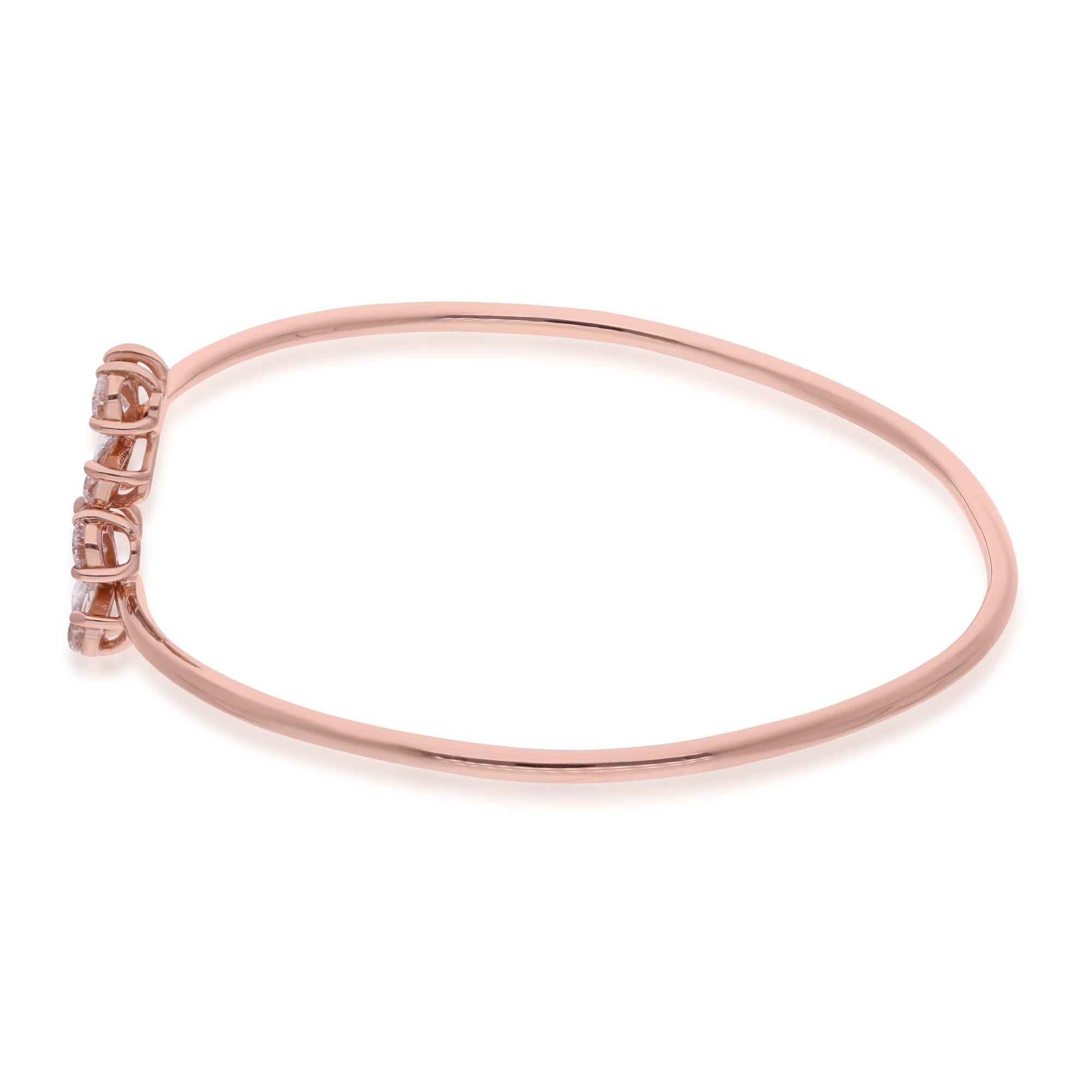 Step into the realm of timeless elegance with this captivating Natural 1.32 Carat Pear Shape Diamond Bangle Bracelet, delicately crafted in 14 Karat Rose Gold. Radiating with refined grace and understated luxury, this exquisite piece of fine jewelry