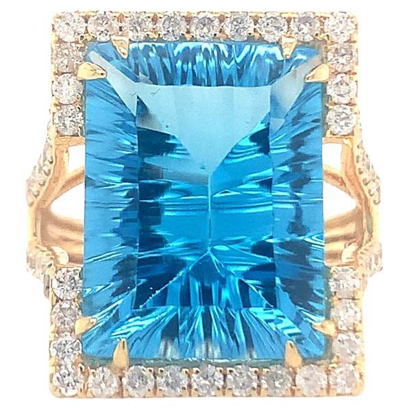 Natural 13.20 carat blue topaz with diamond gold ring