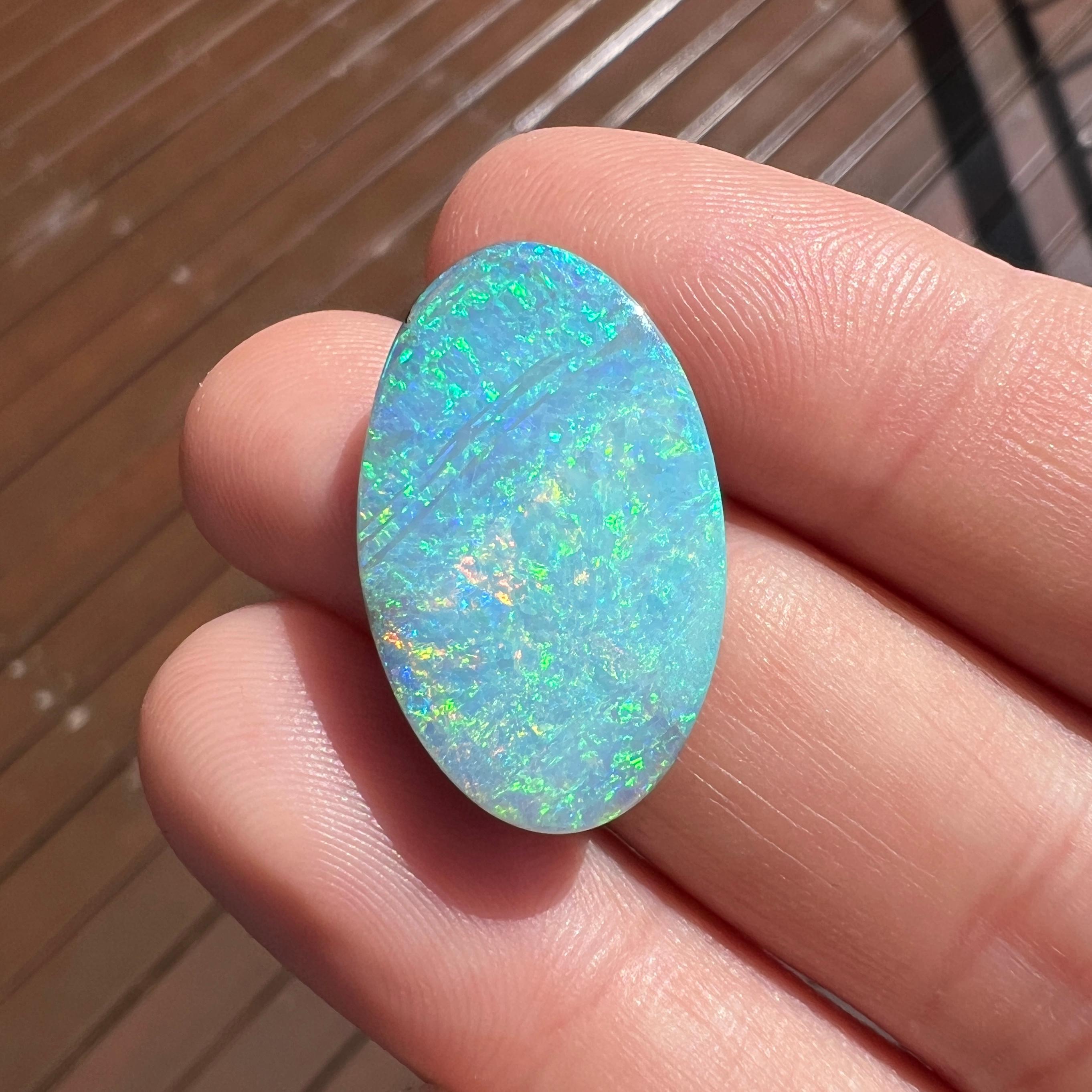 Natural 13.31 Ct Austalian Boulder Oval Opal mined by Sue Cooper For Sale 1