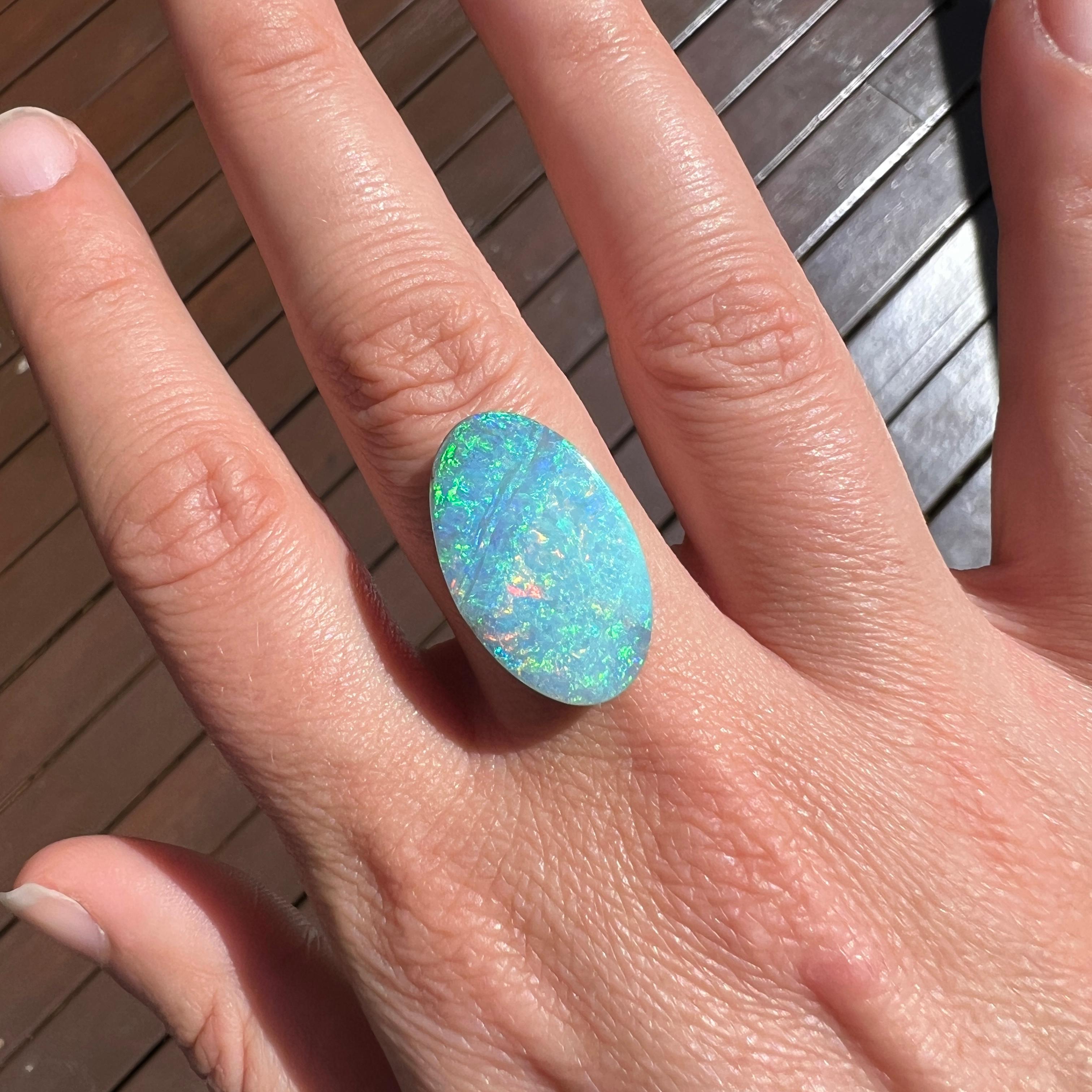 Natural 13.31 Ct Austalian Boulder Oval Opal mined by Sue Cooper For Sale 2
