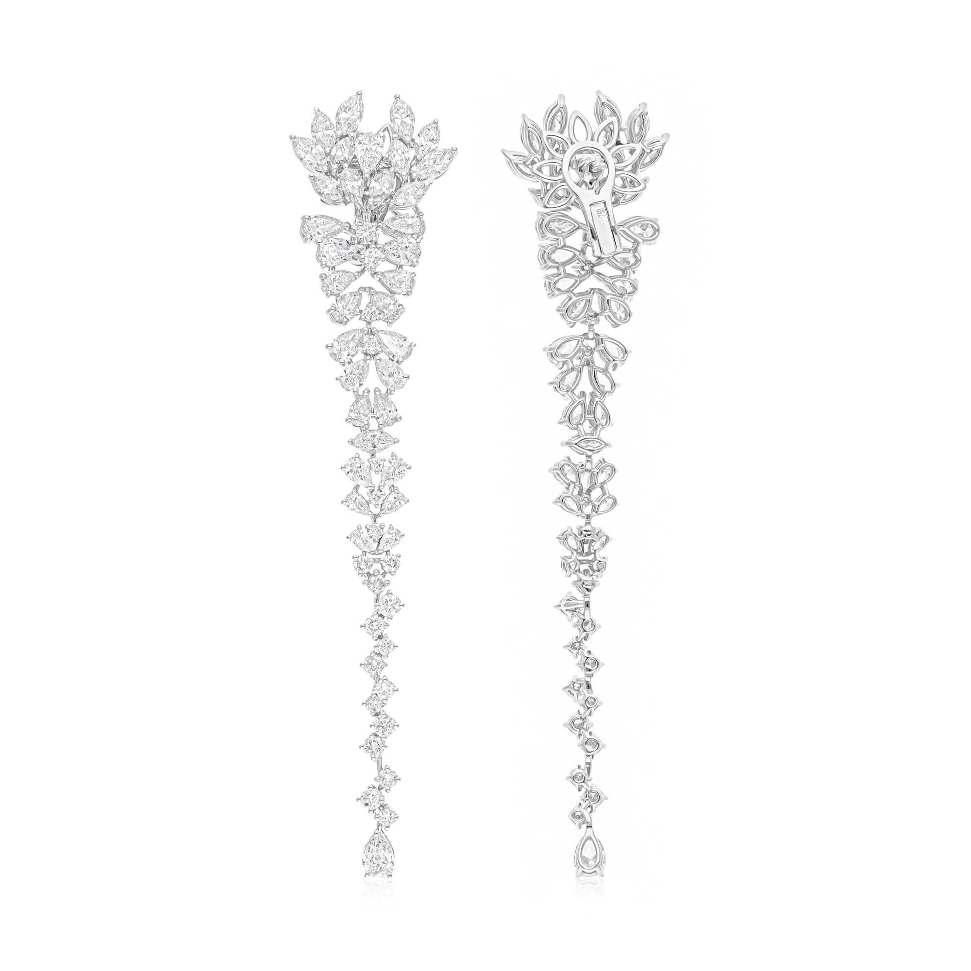 Coulées dans de l'or 18 carats, ces boucles d'oreilles exquises sont serties de 13,47 carats de diamants étincelants.

Suivez la vitrine de Spectrum Jewels pour découvrir la dernière collection et les pièces exclusives. Spectrum Jewels est fièrement