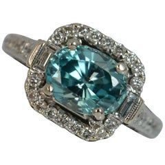Natural 1.40 Carat Diamond and Blue Zircon 18 Carat White Gold Halo Ring