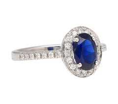 Natural 1.45 Carat Oval Cut Blue Sapphire and Diamond Halo 18k White Gold Ring
