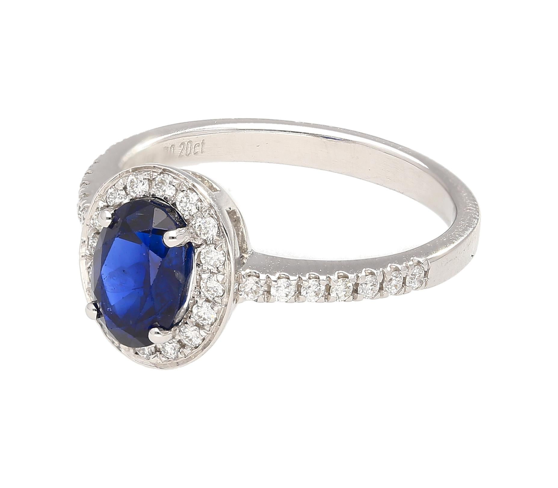 Contemporary Natural 1.45 Carat Oval Cut Blue Sapphire and Diamond Halo 18k White Gold Ring For Sale
