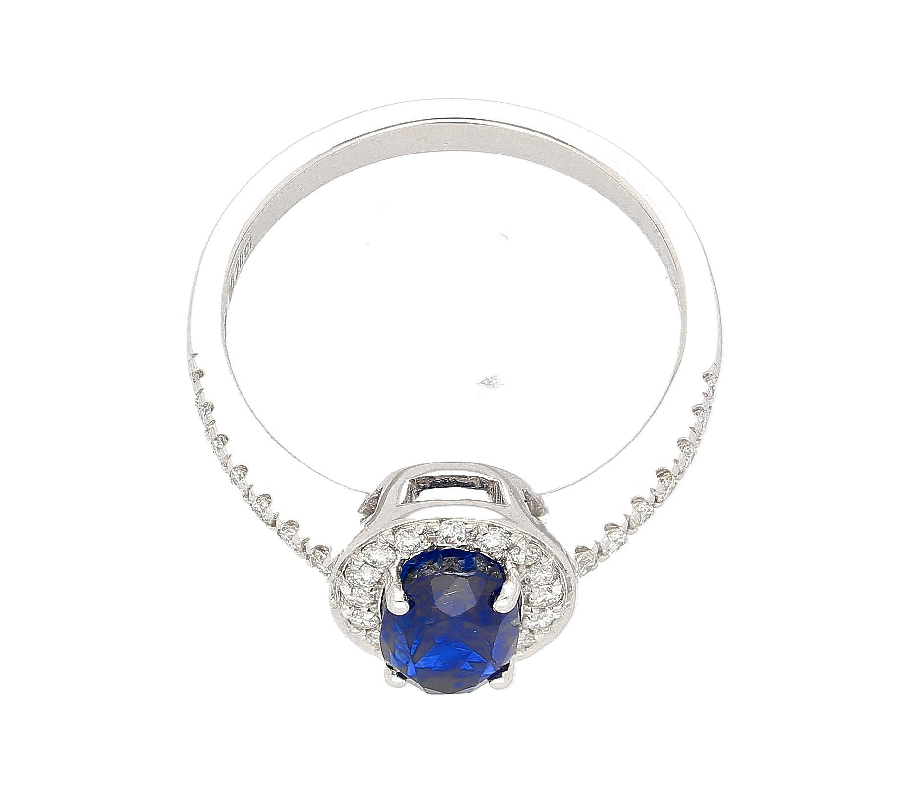 Natural 1.45 Carat Oval Cut Blue Sapphire and Diamond Halo 18k White Gold Ring For Sale 1