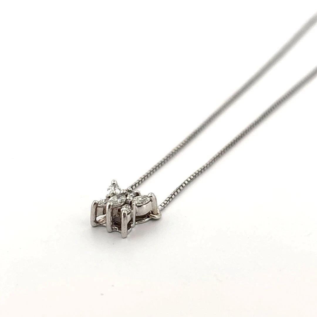 Charming 10K white gold necklace featuring a butterfly and dragonfly pendant design. The butterfly measures approximately 7.63 x 6.81 mm and is prong-set with six (6) natural marquise and round brilliant cut diamonds totaling 0.14 carats. Diamonds