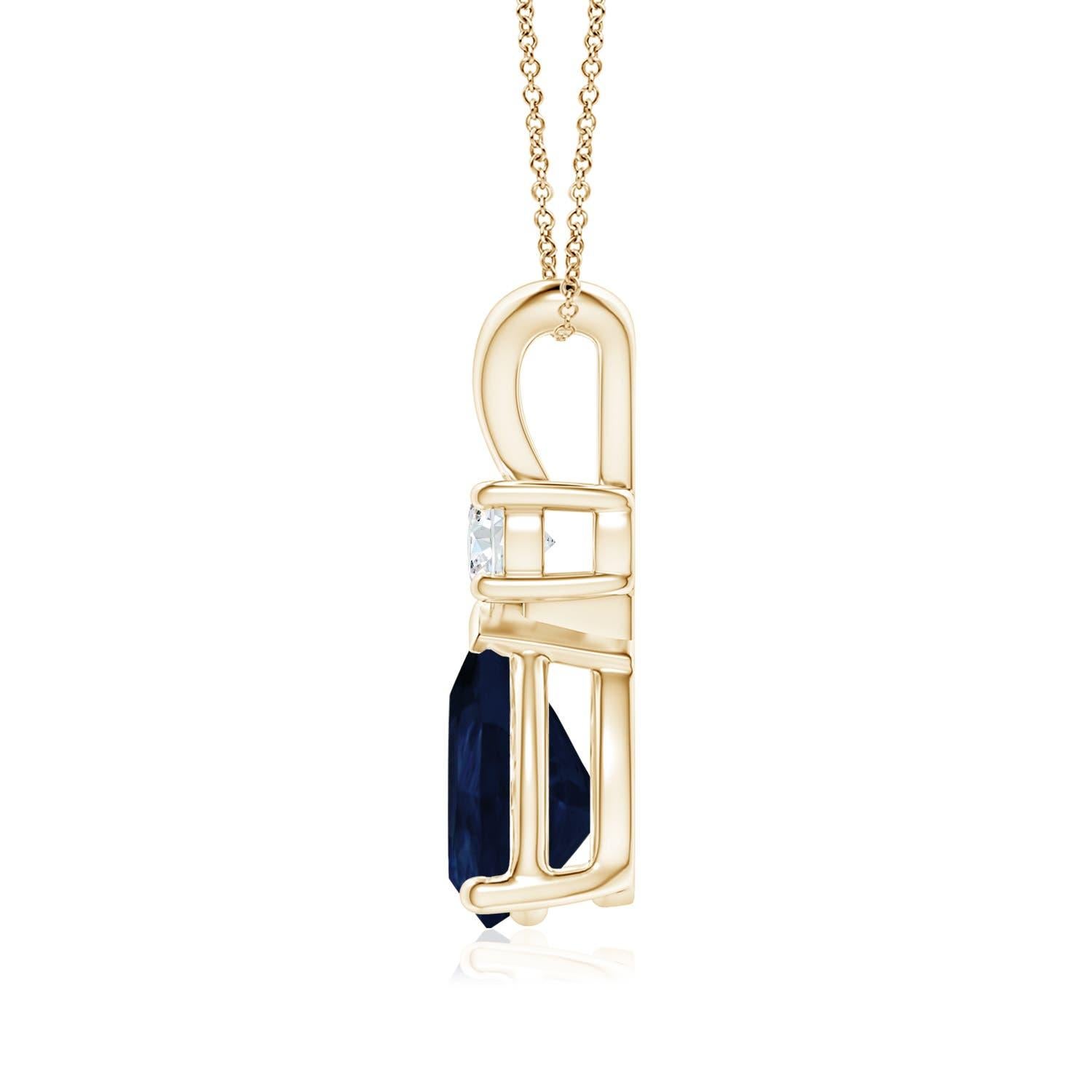 This classic solitaire pendant features a pear-shaped sapphire secured in a prong setting. A brilliant round diamond sits atop the blue gemstone adding to the design's charm. Simple yet appealing, this sapphire pendant in 14k yellow gold is crafted