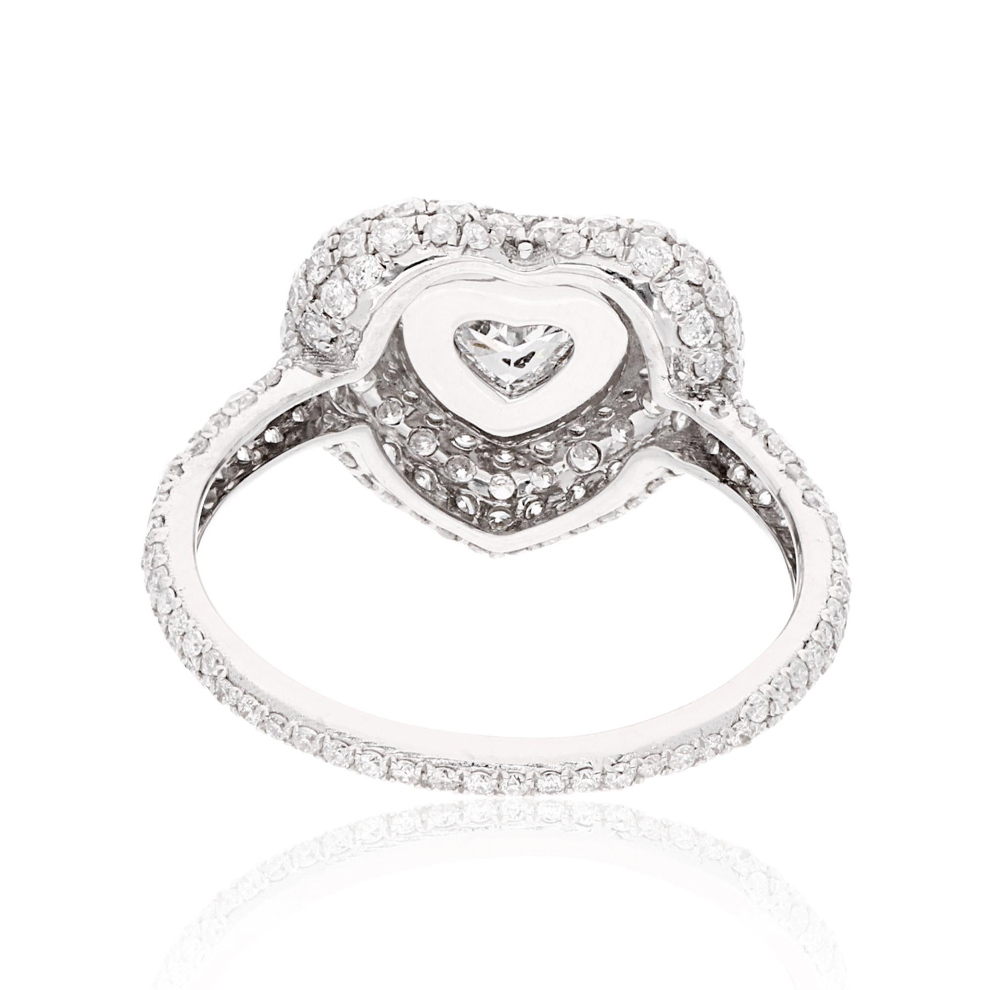 Make a bold statement with this breathtaking handmade cocktail ring, featuring a mesmerizing 1.57 carat heart-shaped diamond pavé set in 18-karat white gold. This ring exemplifies the pinnacle of fine jewelry craftsmanship and design.

The ring is a