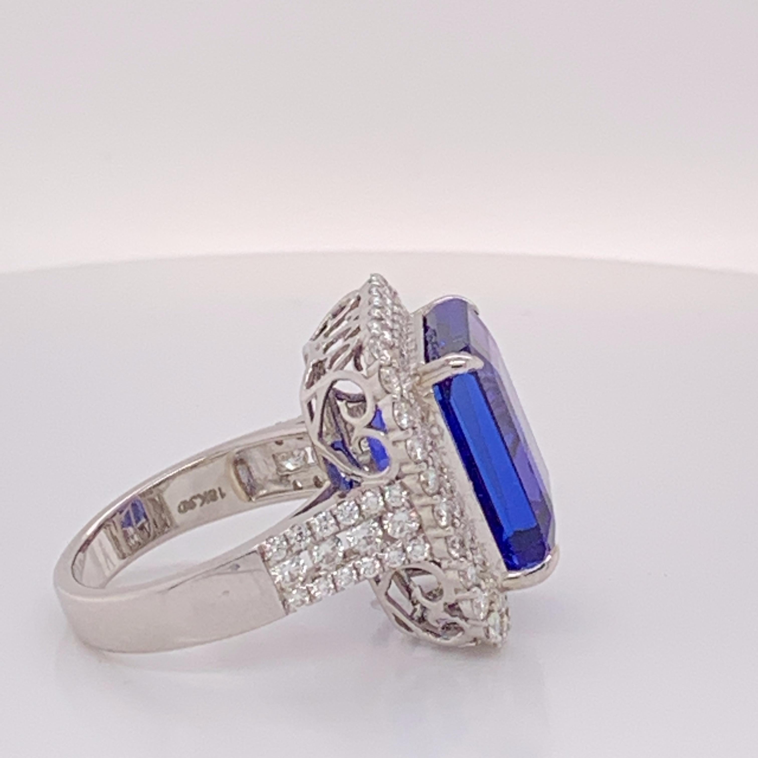 Natural Octagon shape 15.83 Carat Tanzanite and 1.65 Carat Round white Diamond set in 18 Karat gold is one of a kind Ring . The ring is Sizeable 7.5. 

The  Tanzanite is certified by AGL lab. If you have any question regarding this ring please feel