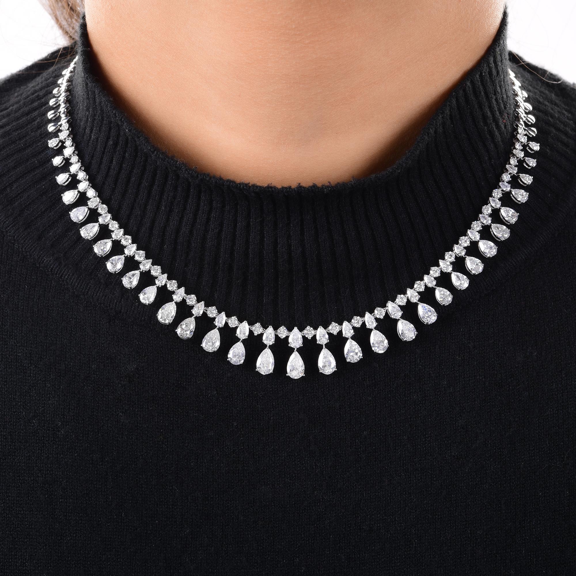 Diese natürliche 15,99-Karat-Diamant-Halskette aus 14 Karat Weißgold zeichnet sich durch Diamanten im Birnen- und Rundschliff aus, die abwechselnd in eine Kette aus Diamanten mit größeren birnenförmigen Diamanttropfen eingefasst sind, wodurch die