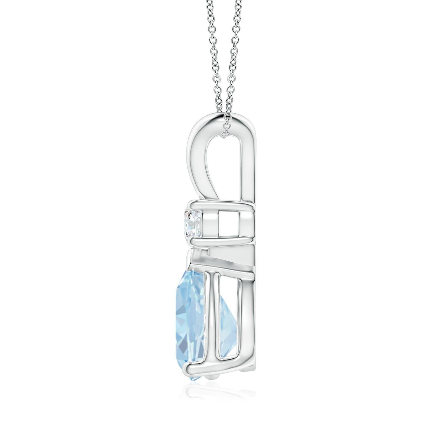 This classic solitaire pendant features a pear-shaped aquamarine secured in a prong setting. A radiant diamond sits atop the pastel blue gemstone adding to the design's sparkle. Crafted in 18k white gold, this polished v-bale pendant is sure to draw