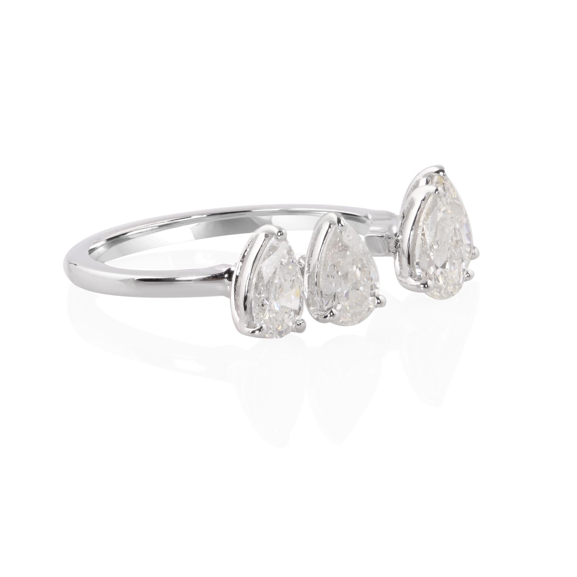 At the heart of this stunning cuff ring lies a breathtaking pear-shaped diamond, boasting a weight of 1.65 carats. Its graceful silhouette and brilliant facets exude a captivating allure that mesmerizes the beholder. Set against the backdrop of