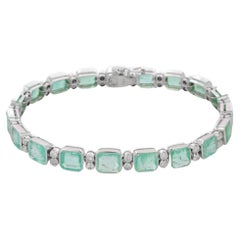 Bracelet tennis en or blanc 18 carats serti d'émeraudes naturelles de 16,85 carats et de diamants