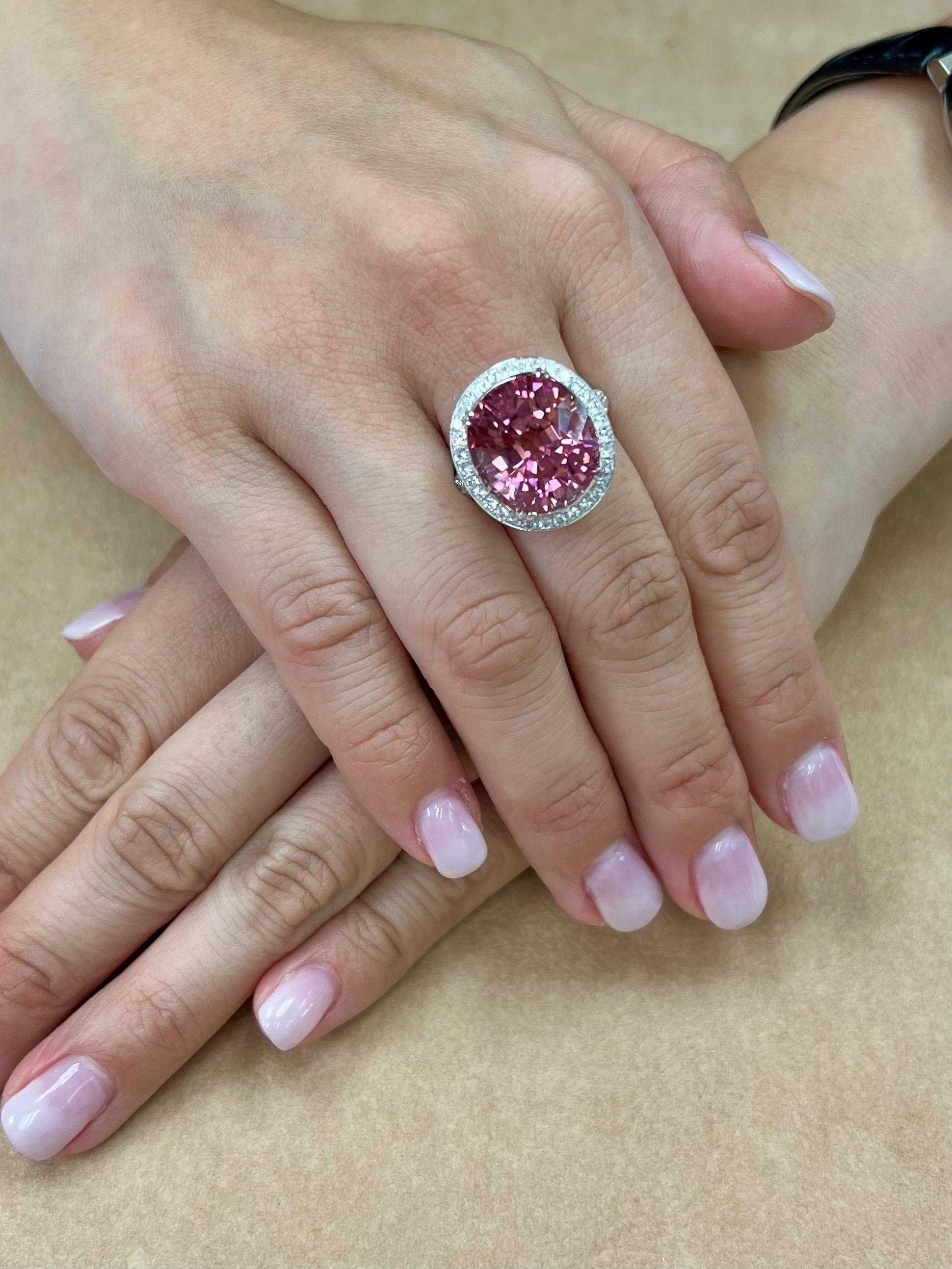Please check out the HD video! Here is a large oversized 17+ cts pink tourmaline ring with 2.60cts of white diamonds. This ring will defiantly make a statement. The color really 