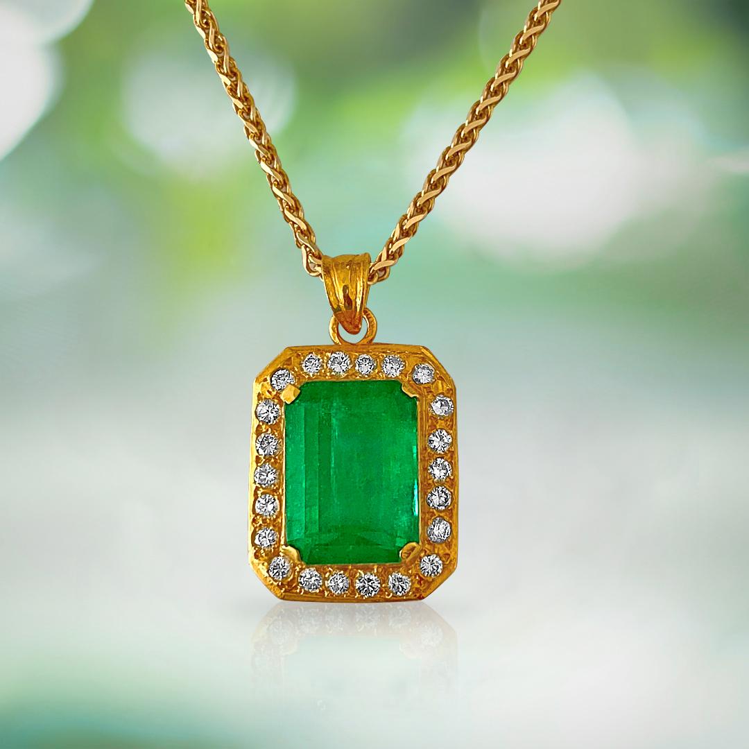 Metal: 21K Yellow Gold. (Middle eastern style)

100% natural earth mined 17.00 carat Colombian Emerald. 
Emerald cut set in prong setting. 

2.00 carat diamonds total. VVS clarity and F color. Round brilliant cut set in bead setting. 100% natural