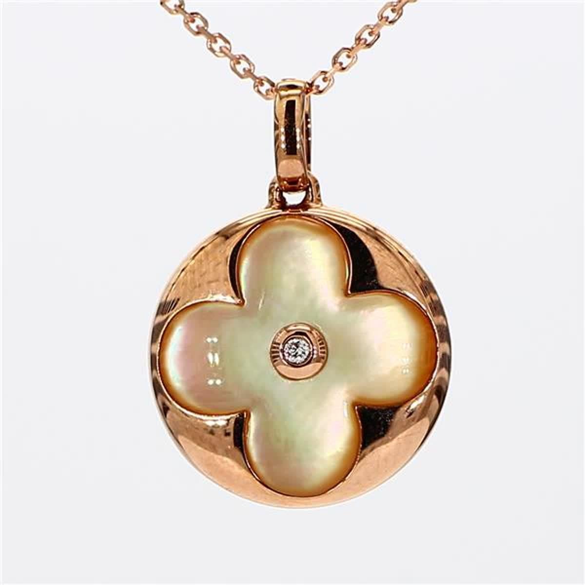 RareGemWorld's classic yellow shell and pearl pendant. Mounted in a beautiful 18K Rose Gold setting with a natural pearl and a  natural yellow shell. The center pieces are complimented by a natural round white diamond. This pendant is guaranteed to