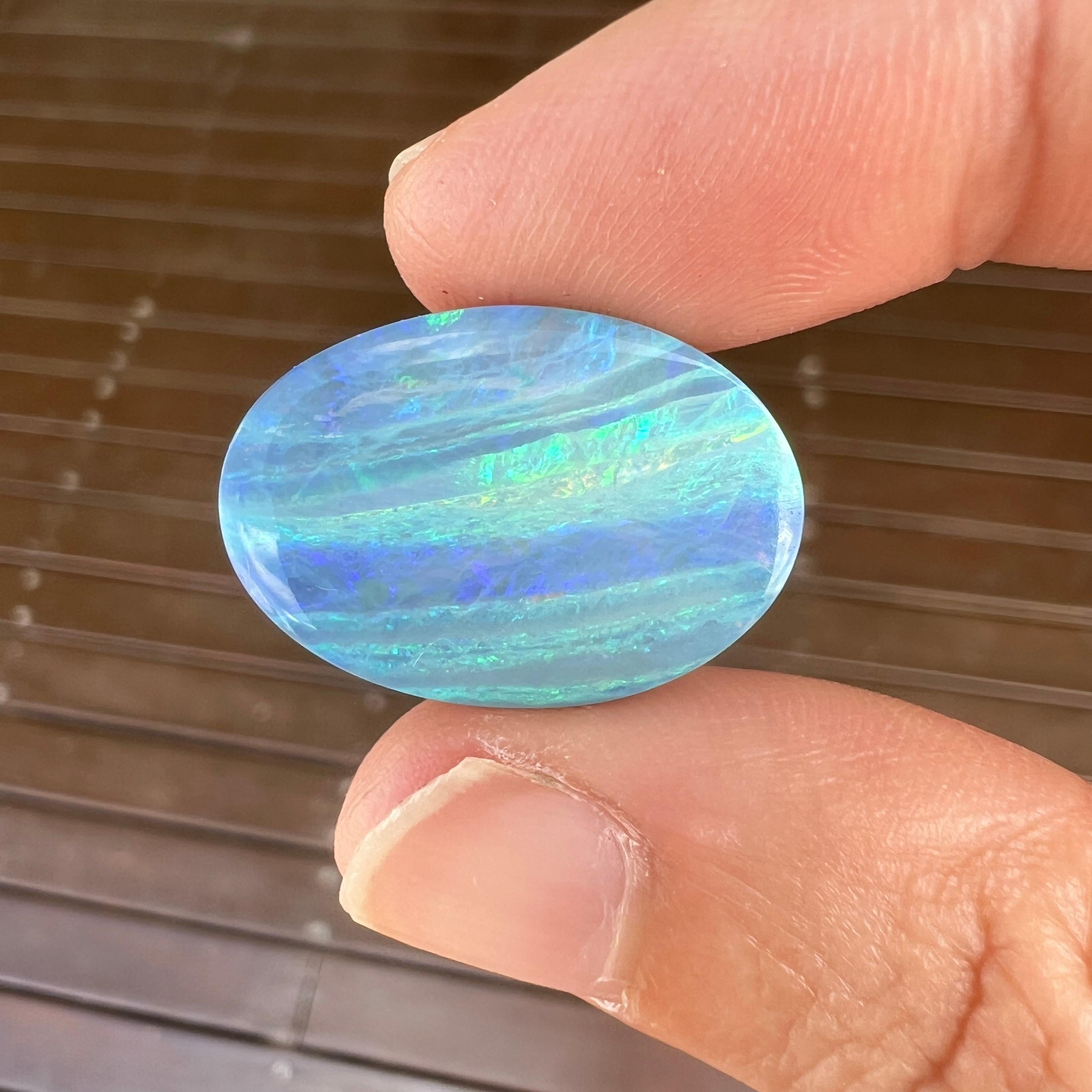 Cabochon Natural 17.99 Ct Australian stripy green-blue boulder opal mined by Sue Cooper For Sale