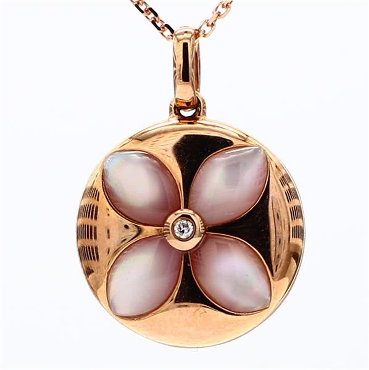 RareGemWorld's classic pink shell and pearl pendant. Mounted in a beautiful 18K Rose Gold setting with a natural pearl and a natural pink shell. The center pieces are complimented by a natural round white diamond. This pendant is guaranteed to