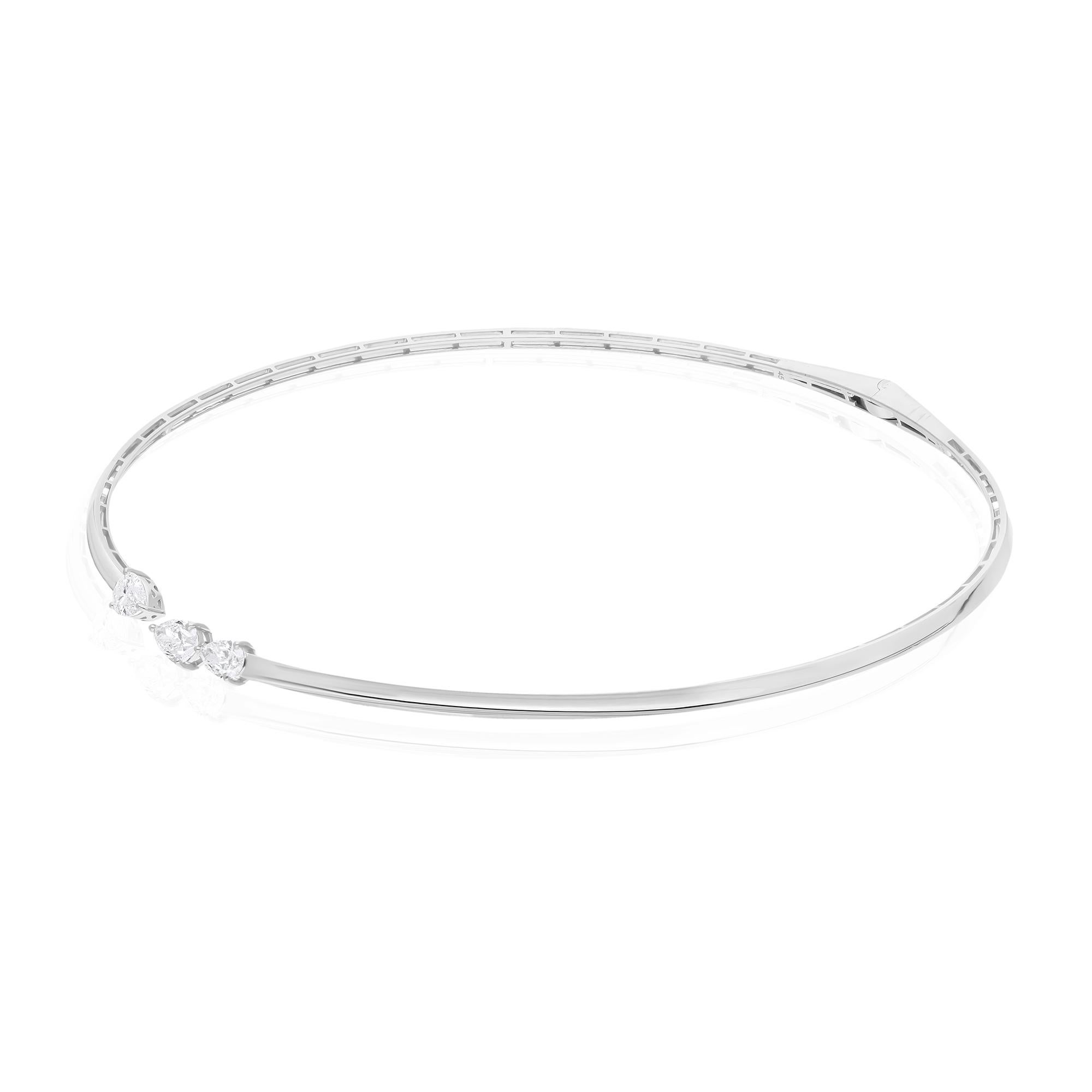 Immerse yourself in the epitome of sophistication with this breathtaking Natural 1.85 Carat Pear Diamond Choker Necklace, exquisitely crafted in luxurious 14 Karat White Gold. A masterpiece of fine jewelry, this necklace is destined to grace your