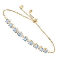 Bracciale tennis con acquamarina naturale da 1,8 carati e diamanti in oro giallo 14 carati