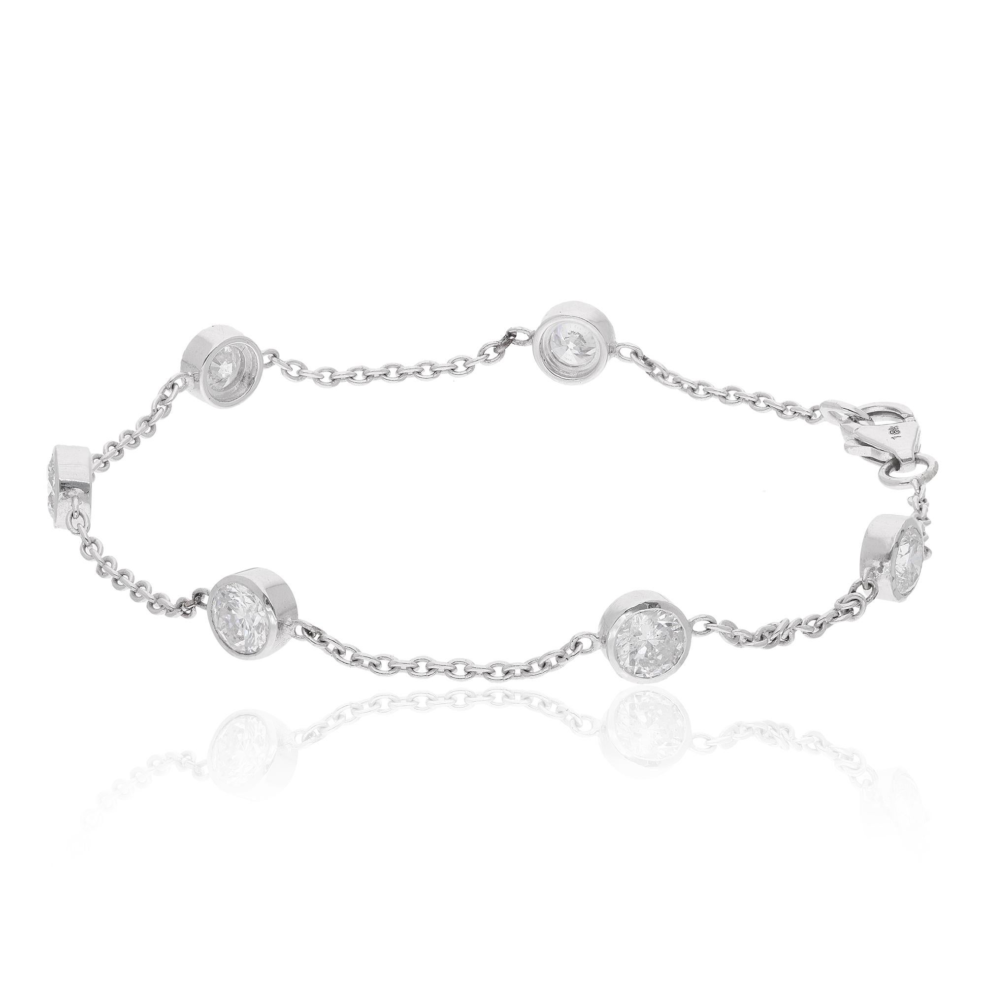 Step into the realm of timeless elegance with this exquisite natural 1.91 carat round diamond bezel set bracelet, meticulously crafted in radiant 14 karat white gold. Delicately designed and expertly executed, this bracelet embodies sophistication