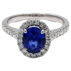 Natural Blue Oval Sapphire and White Diamond 2.37 Carat TW Gold Cocktail Ring