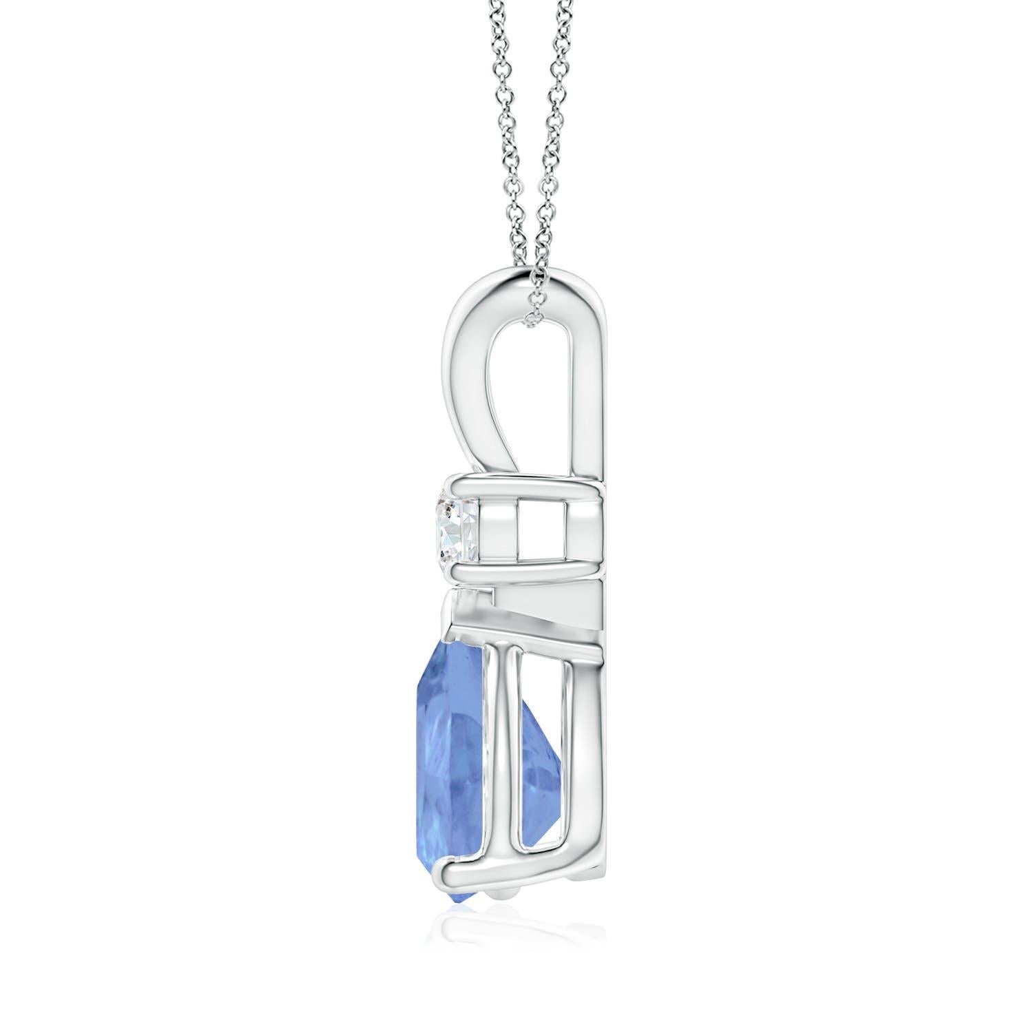 This classic solitaire pendant features a pear-shaped tanzanite secured in a prong setting. A glimmering round diamond sits atop the bluish-violet gemstone adding to the design's sparkle. Simple yet alluring, this tanzanite pendant in 14k white gold