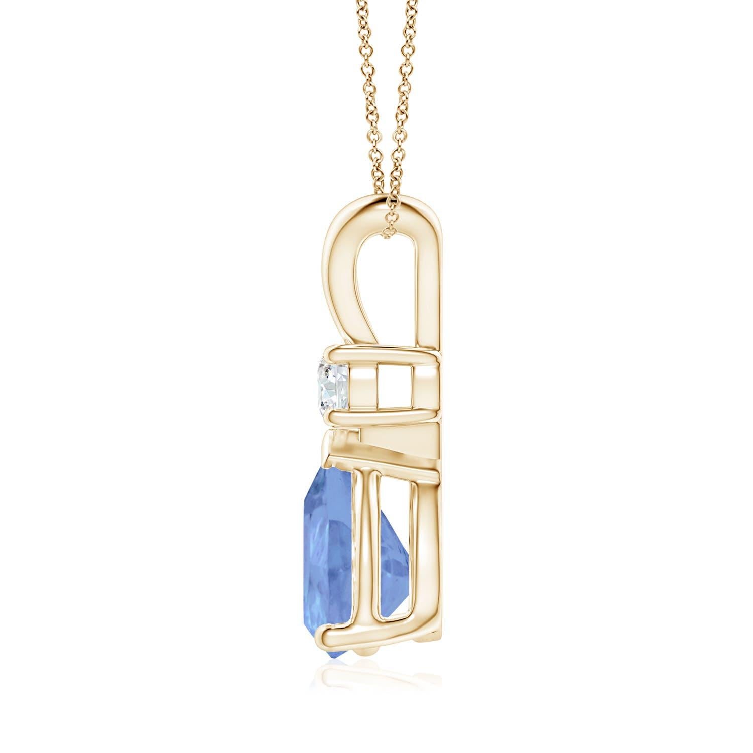 This classic solitaire pendant features a pear-shaped tanzanite secured in a prong setting. A glimmering round diamond sits atop the bluish-violet gemstone adding to the design's sparkle. Simple yet alluring, this tanzanite pendant in 14k yellow