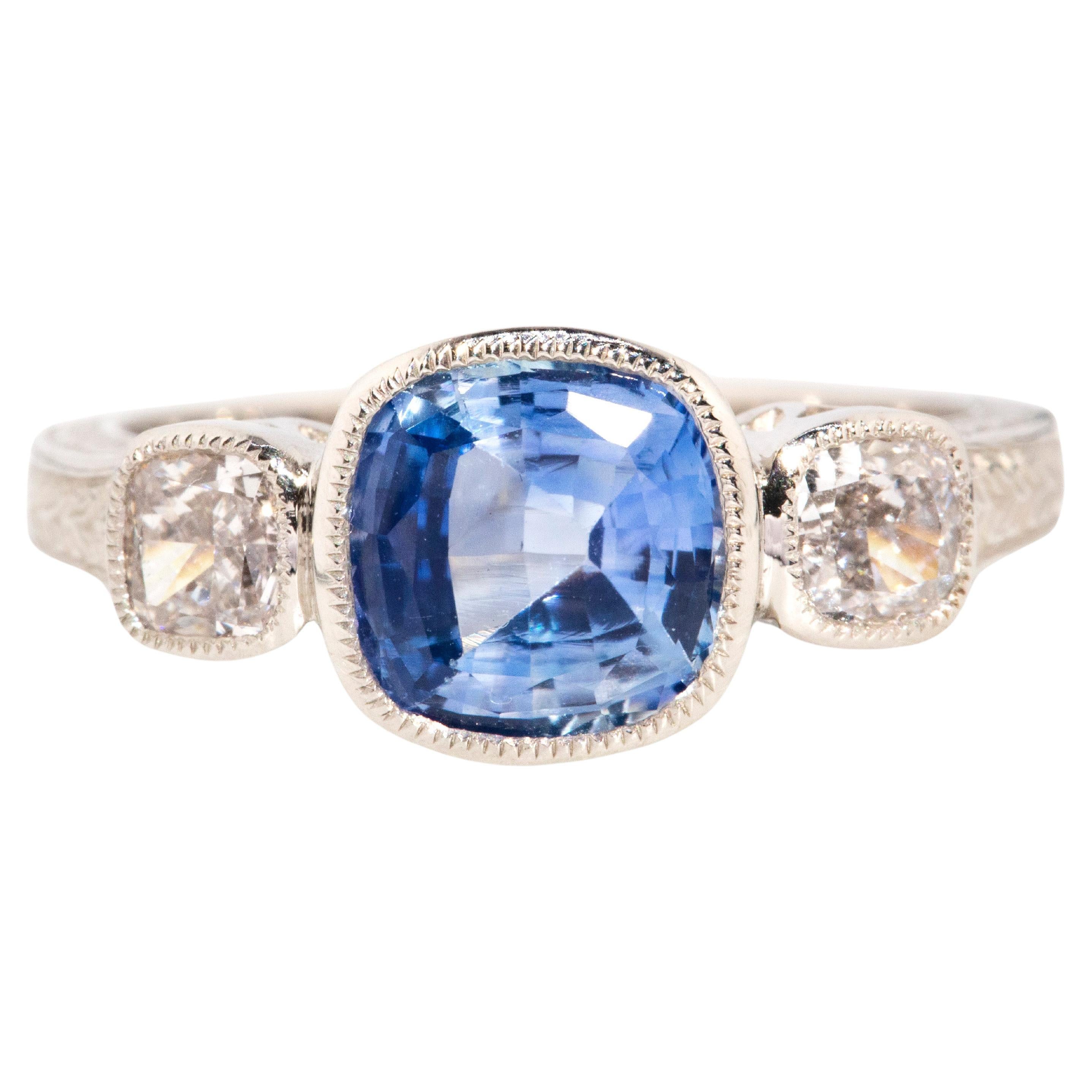Natural 1.96 Carat Cushion Cut Blue Sapphire & Diamond Platinum Trilogy Ring For Sale