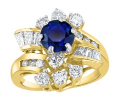 Anillo de oro amarillo de 14k con un zafiro azul redondo natural de 1 quilate y un diamante de 1,65 quilates