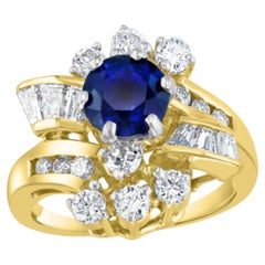 Anillo de oro amarillo de 14k con un zafiro azul redondo natural de 1 quilate y un diamante de 1,65 quilates