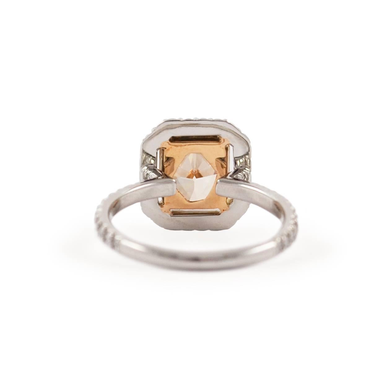 Radiant Cut 2.01 ct GIA Fancy Yellowish Orange Cushion Diamond Halo Engagement Ring For Sale